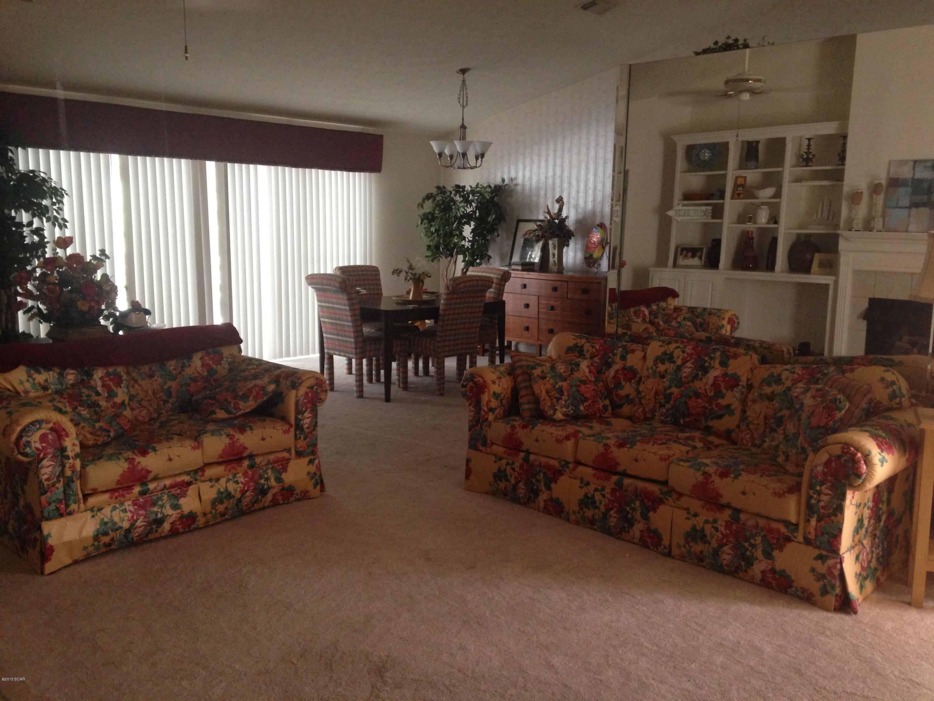 This home in the popular Glades subdivision features a screen-enclosed patio and in-ground pool.  The interior features an open floor plan with split bedrooms.  In the kitchen you will find a professional level gas range.  The living room has built-in shelves surrounding the fireplace.  The master bedroom features a spacious attached master bath with his and hers closets.  There is plenty of additional storage in the laundry room and garage.  The front of the home features a courtyard area that provides privacy to the home.