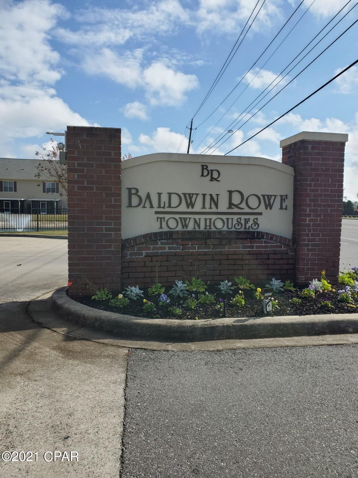 Welcome to Baldwin Rowe! Enjoy comfortable living in this desirable gated community featuring a community pool and beautifully maintained grounds. 

This well-maintained townhome offers 3 bedrooms and 2 full bathrooms upstairs, plus a half bath downstairs for guests. The open-concept floor plan features a spacious living and dining area, with a kitchen that includes a breakfast bar overlooking the main living space--perfect for entertaining and everyday living. Step outside to the screened porch, where privacy fencing on each side allows you to relax while enjoying peaceful views of the pond and fountain. 

 Conveniently located in Panama City,  near Lynn Haven, and Highway 390, providing easy access to area beaches, shopping, dining, schools, and everyday conveniences. Call for a tour today.