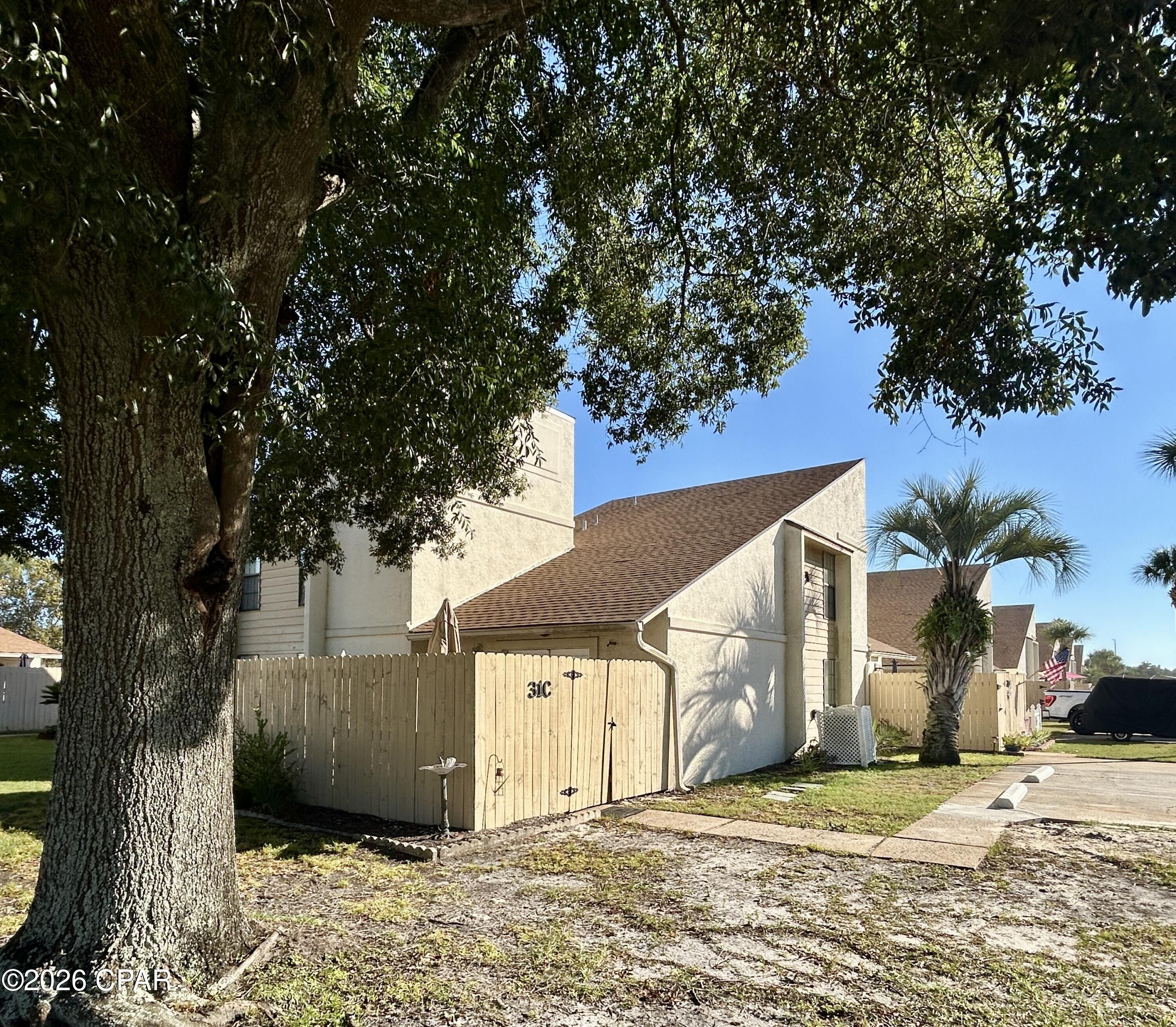 *Seller Financing Available!**Beach Condo investment opportunity with proven rental history! Fully furnished 2BR/2BA unit in the gated neighborhood of Horizon South. Outdoor space with privacy fence. Golf cart friendly with plenty of parking spots close to the beach or short walk to the beach.
Updates include stainless refrigerator, AC 2021, updated water heater.

Owners and guests alike enjoy access to an  array of resort-style amenities, including a private beach entrance, mini golf, four swimming pools (one heated for year-round use), hot tub, fitness center, game room, and community spaces. Stay active with tennis courts, basketball, and shuffleboard--all within this gated community.

Rental history available upon request. All measurements are approximate and should be verified if important.