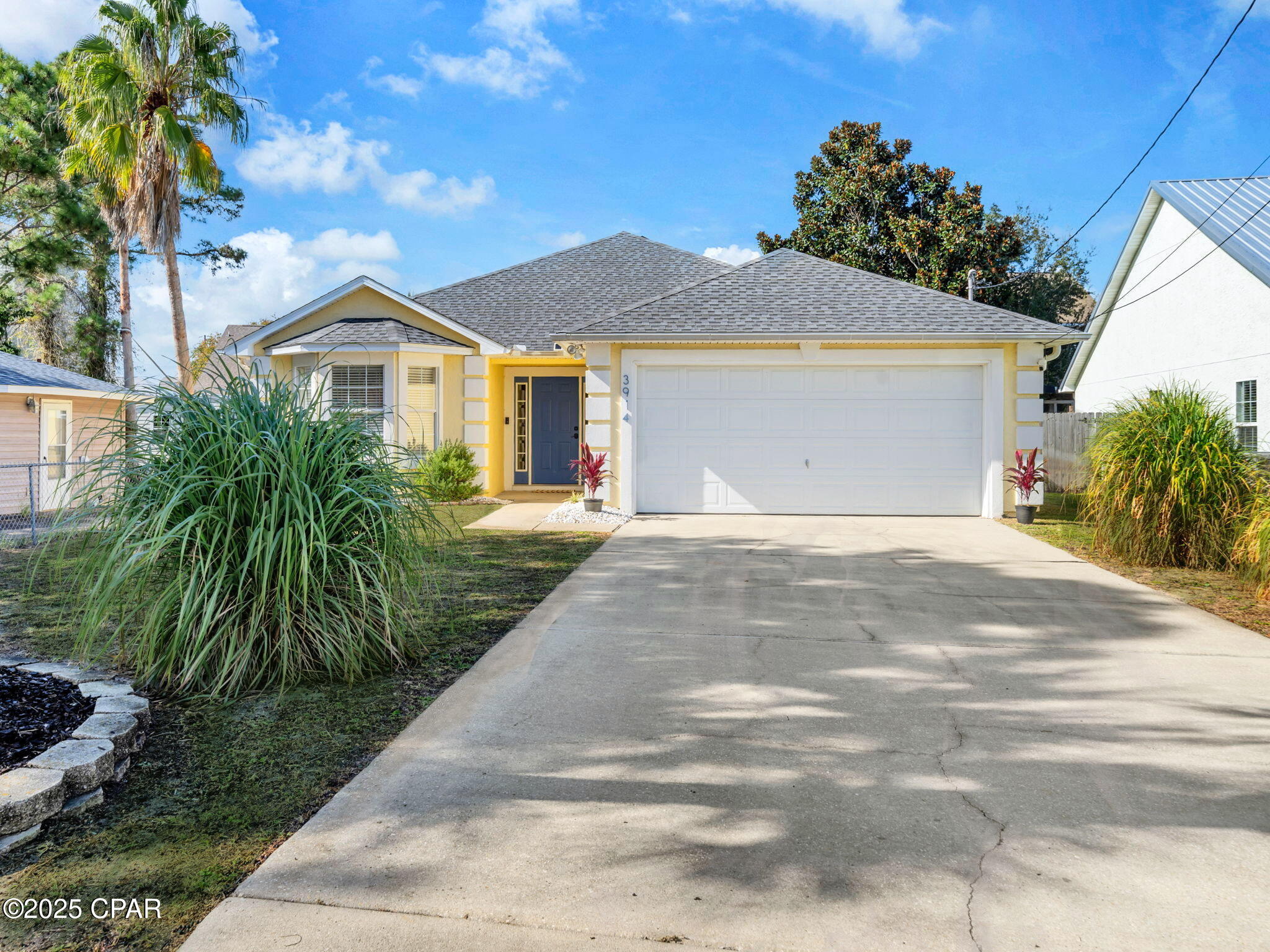CURRENTLY UNDER CONTRACT, SELLER WILL CONSIDER BACKUP OFFERS. THE ONE YOU'VE BEEN WAITING FOR! Only 2.5 blocks from the beach, this 3 bedroom 2 bath custom built home has been recently updated, and comes fully furnished! Short term rentals are allowed, neighborhood is golf cart friendly, and there is no HOA. Boasting 1451 square feet of space, 2 car garage, vaulted ceilings and cozy fireplace, this gorgeous home was designed with an open concept floor plan to offer spacious indoor and outdoor living areas that provide the absolute perfect accommodations for you, your family and your guests. You will love the tasteful new decor, new furnishings, and fresh paint inside & out. Most of all, you will enjoy that it is all walking distance to the world's most beautiful beaches! Features include an extra large master suite with bay window, large laundry room with full size washer and dryer, upgraded LVP flooring, owners closet, security cameras, smart thermostat, as well as new HVAC system, 2019 roof, new LG appliances, and a newly designed outdoor patio area that creates a private backyard oasis, providing ambiance with plenty of seating, space to eat, entertain, grill and relax. Next to the covered pergola, the Adirondack chairs surround the fire pit, and hammocks hang waiting in the trees. All topped off with a sprinkle of lights overhead, perfect for intimate evenings or early morning coffees. This is truly the perfect property for a forever home, vacation getaway, or investment opportunity. In addition, septic is in the front yard, so installing a pool in the back yard is an option. As an investment property, this home is rated as a ''Guest favorite'' on Airbnb based on ratings, reviews, and reliability, producing $37K in rental income in 2024, its first year as a vacation rental, and already at $20K for 2026. This seaside dream is 1/2 mile from beach access #14,#15, and #16, a 5 minute walk to Richard Selzer Park, and a short walk or golf cart ride to some of the very best restaurants and entertainment spots that PCB has to offer. Also nearby are marinas, public boat ramps, St. Andrews State Park, and more! Experience the ultimate in coastal living. This beautifully updated home is ready to enjoy! Truly turnkey, all this house is missing is you! Call today for your private viewing. *All information is approximate and should be verified by buyer if important.