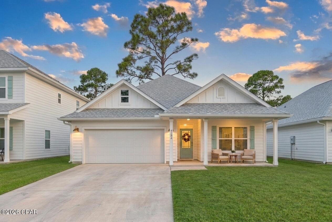 Coming Soon - No Showings. Great Primary Residence or Short-Term Rental Opportunity in Panama City Beach!
This beautifully upgraded 2021 new-build 3BR/2BA home features a split floor plan with tray ceilings in the living room and master suite. Recent updates include new LVP flooring, quartz countertops throughout, tile backsplash, new refrigerator and stove, shiplap electric fireplace, fresh paint, recessed lighting throughout, upgraded plumbing fixtures, and door hardware. The home is pre-wired for two Tesla chargers and offers a small, low-maintenance yard with new Zoysia grass and palm trees out front. Additional storage is available above the garage.
Short-term rentals are allowed, most furnishings are negotinable for a rental ready income producing proeprty. As a 2021 build, you'll benefit from some of the lowest insurance premiums on the beach plus peace of mind with a newer roof, AC, and major systems. The community also features one of the lowest HOA fees on the beach and includes a dog park.
Located less than 1 mile from the Navy base, marina with boat slips, and sports complex/baseball fields. The nearby sports complex boosts rental demand from traveling baseball teams and tournaments. Just 3 miles from the white sandy beaches. Perfect for enjoying as your personal beach home when in town while generating strong rental income when away. Projected annual gross rental income of $42,000.
