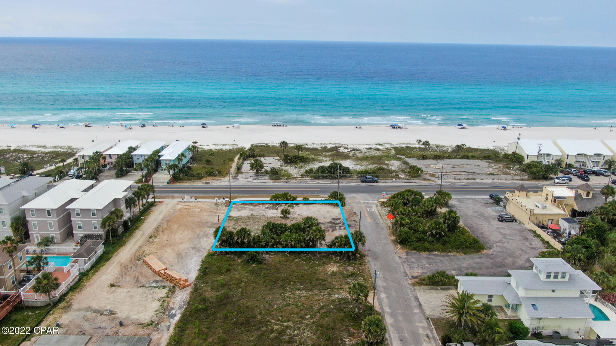 Rare find, commercial vacant corner lot on front beach road across from the Gulf of Mexico, zoned C-2, in Luguna Beach area. This lot comes with complete architectural drawings and building plans for a 3000 square foot store. Great for gift shop, coffee shop or conveience store., multiple options for land use.  Complete construction plans available upon request. This lot is located in desirable tourist area.

Owner financing available with competitive interest rate.

Buyer to verify all information.