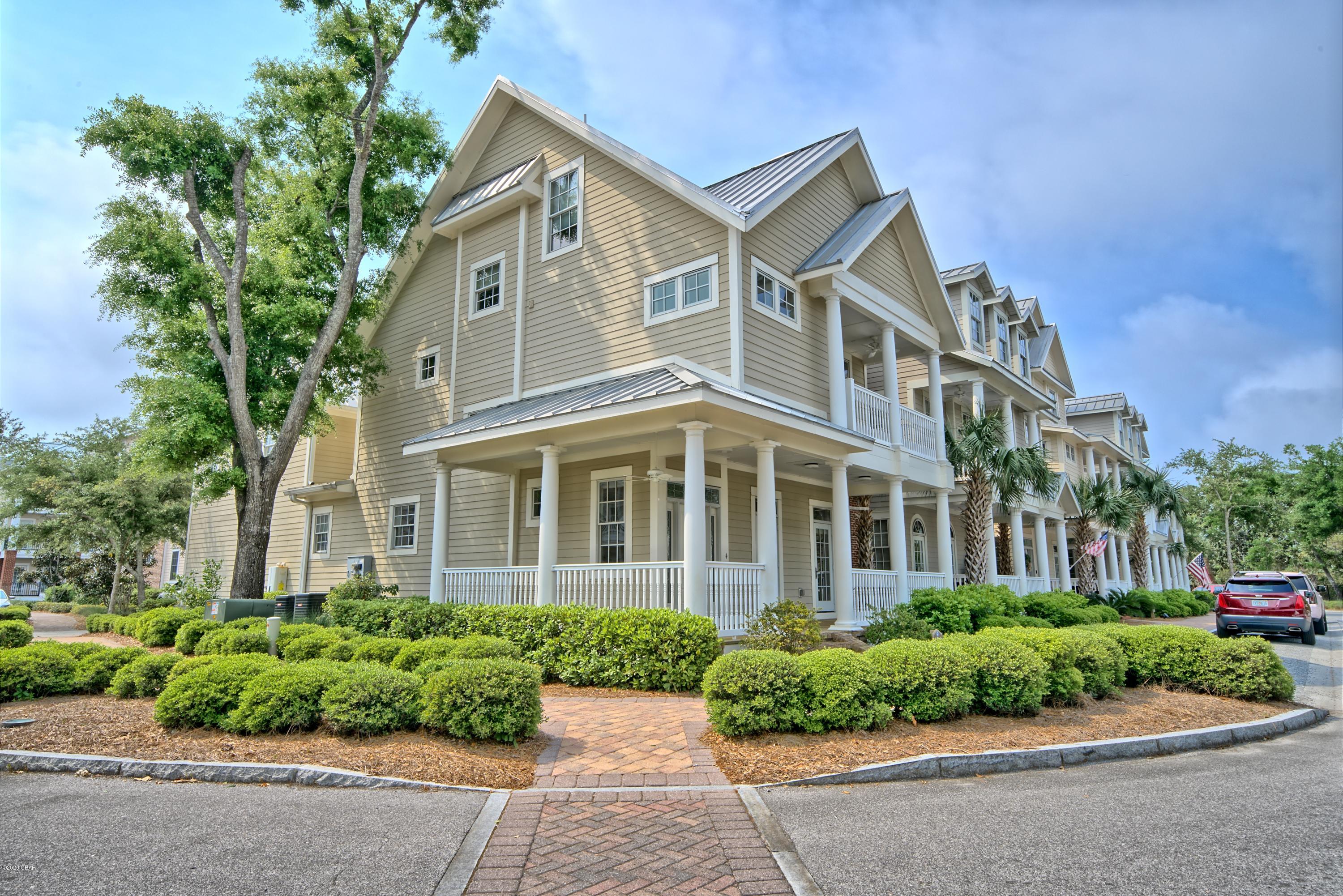 Gorgeous Bay front community of Waterhaven, location is everything, corner lot, single family unit with a view. The 1st floor of this home has lots of natural light filling the living room with a cozy gas fireplace, real wood floors, dining room, kitchen, office nook, a half bath and the laundry room. Kitchen has a high grade 6 burner gas stove, subzero refrigerator, and ice machine. Granite countertops throughout this home, not just in the kitchen but all bathroom vanity's.Second floor has a grand master suite with its own covered porch and an en suite with exquisite touches. There are two additional bedrooms in main house & both have their own full baths.Just off the dining room is a courtyard, great for BBQ or coffee in am, it leads to the Carriage house located just above 2 car garage. Carriage house is spacious, has a living room, full kitchen, separate bedroom with a full bath.Perfect for a young adult or in-law suite.  
The amenities of Waterhaven are wonderful:
The longest dock on St. Andrew's Bay available to owners as a day dock, Boat ramp, A separate lot for boat or trailer storage, A gorgeous Bay front pool with restrooms,A community building with community room, kitchen, a theater with group seating, fitness center, a back deck and summer kitchen if you have a crowd to entertain.
Information believed to be accurate but is not guaranteed. If important, please verify or measure.