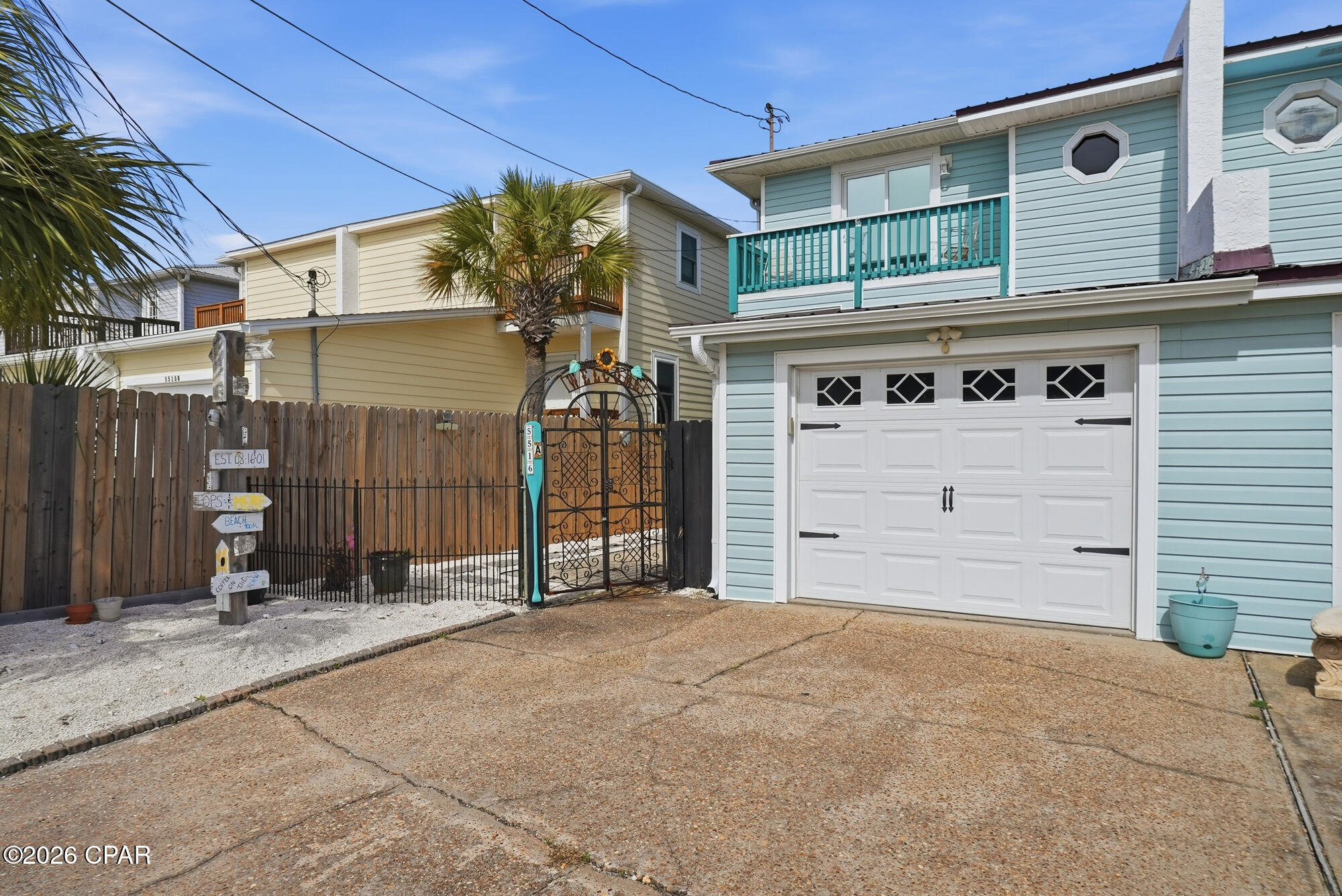 CURRENTLY UNDER CONTRACT, SELLER ACCEPTING BACKUP OFFERS. This 3 bedroom, 2 bathroom side A of the duplex sits on a desirable corner lot just a short walk to Beach Access 9, offering the perfect blend of location and convenience. With nearly 1,300 square feet of living space and a one-car garage, the home is well-suited as a primary residence, vacation getaway, or income-producing short-term rental, which is allowed.

Seller is offering a $2500 paint allowance and major updates were completed in 2022, including a new metal roof, all new appliances, new flooring throughout, and replacement of all windows and sliding glass doors, which have been tinted for added efficiency and privacy. The skylight was also replaced and features a shade for light control. A new lift station and shut-off valve provide added peace of mind.

Outside, the back and side yards are finished with Bahama crushed coral for a clean, low-maintenance coastal look, and the property is fully privacy fenced all the way around. Whether you're looking for personal use or an investment opportunity near the beach, this property offers solid updates and an unbeatable location.