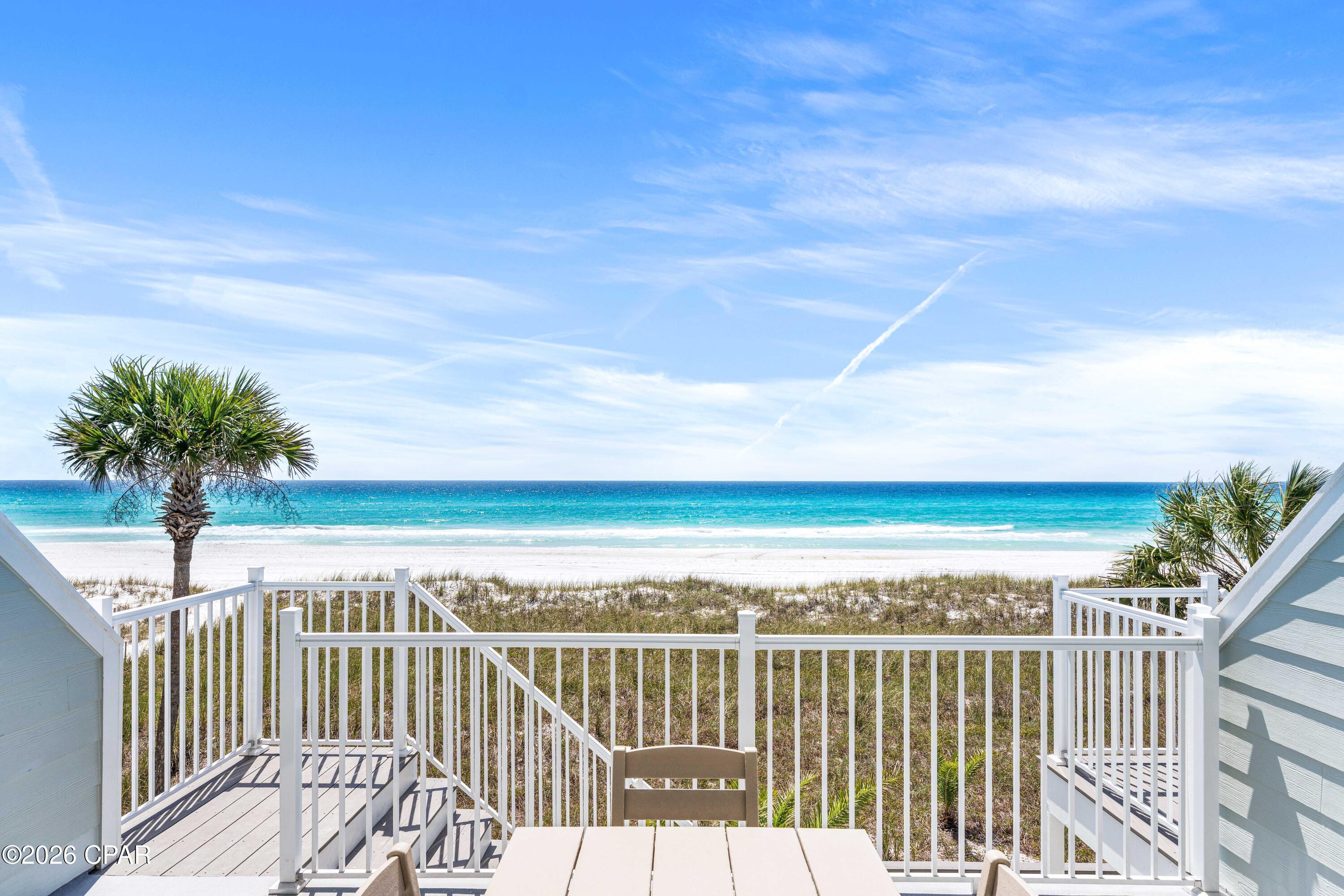 NEWLY RENOVATED! Over $100,000 worth of interior upgrades including new cabinets, flooring, counters, appliances, windows, doors, freshly painted and so much more. Over $100,000 worth of exterior upgrades recently preformed including composite decking, new siding, and modernized metal handrails. This beachfront 2BR/2BA townhome + bunk room has a private garage. Located just ten minutes from 30An and 15 minutes from Topgolf, this Panama City Beach townhome captures both rental markets. This spacious layout was built to preform. Comfortably sleeping 10 (12 with the pull-out sofa) its the perfect vacation home or high-performing short-term rental! Open living spaces filled with natural light and coastal charm while still just steps from the sand! Projected rental: $70K. Come see it today!