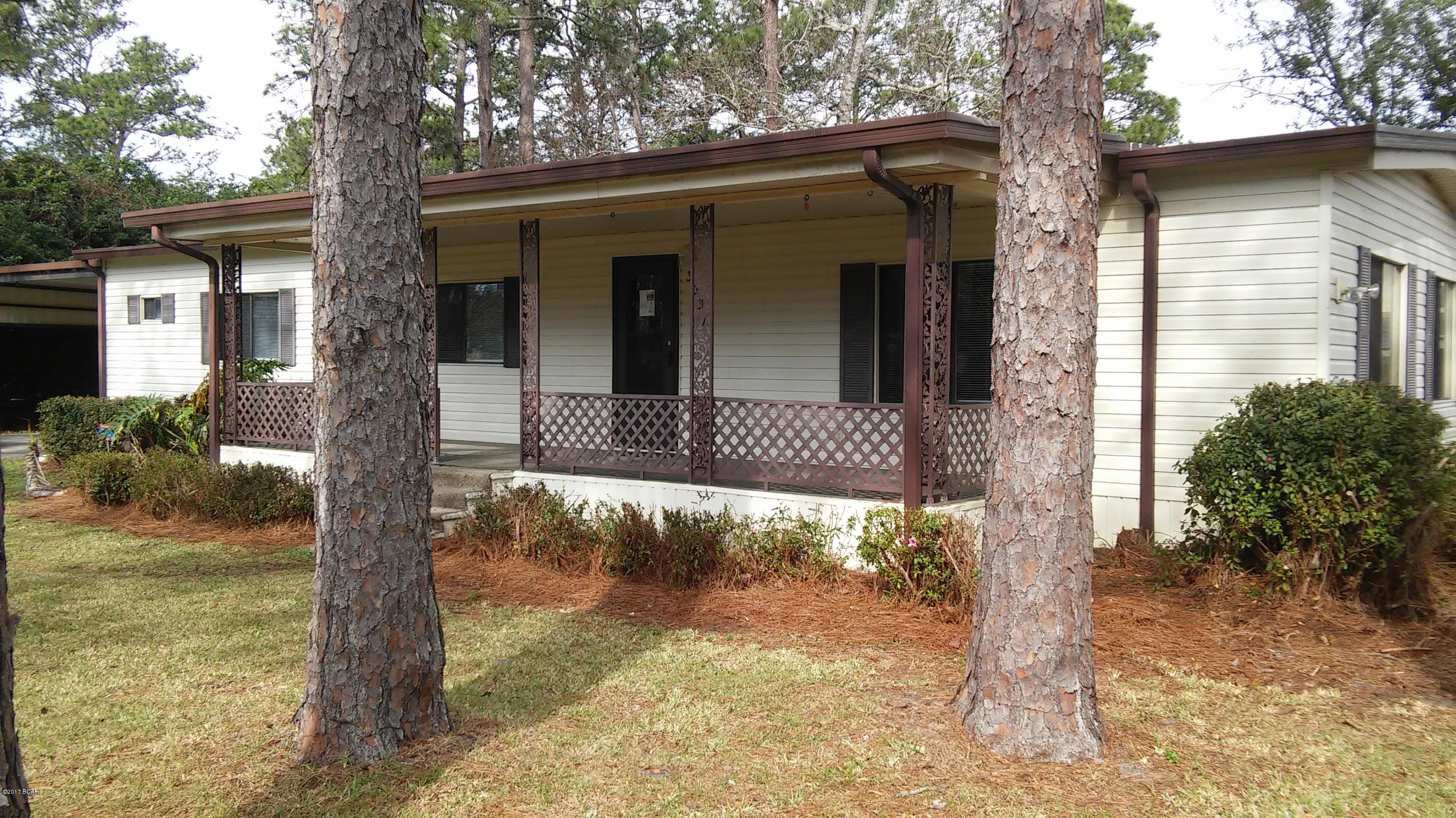 4 bedroom 2 bath modular home with carport.  This home has a living room, den w/fireplace (decoration only), dining area and screened patio.

1 Small Pet Negotiable!