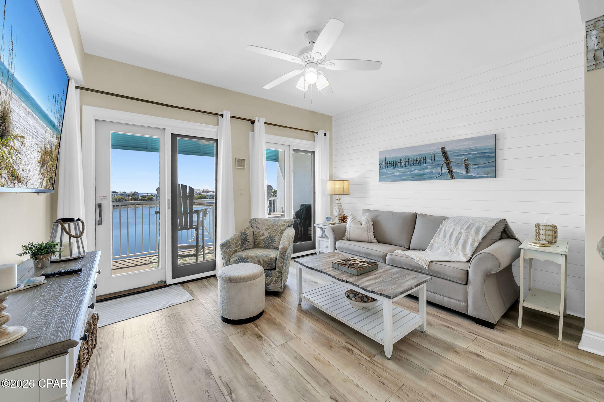 Welcome to Carillon Beach, one of the Emerald Coast's most private and sought-after gated communities. This exceptional 4th-floor lakefront condo offers the rare combination of tranquil lake views and beautiful Gulf views, a privilege enjoyed by only the 4th- and 5th-floor residences. Recently renovated and offered fully turnkey, this elegant 1-bedroom, 1-bath retreat is ideal as a refined personal beach escape or high-demand investment property. Inside, the bright open-concept living and kitchen space is perfectly positioned to capture the peaceful beauty of Lake Carillon, creating a truly scenic coastal setting. A rare and thoughtful design feature - a door separating the bedroom from the main living area -- adds both privacy and practicality. Stylish furnishings, tasteful décor, and an HVAC system just two years old complete this beautifully updated residence, ready for immediate enjoyment.