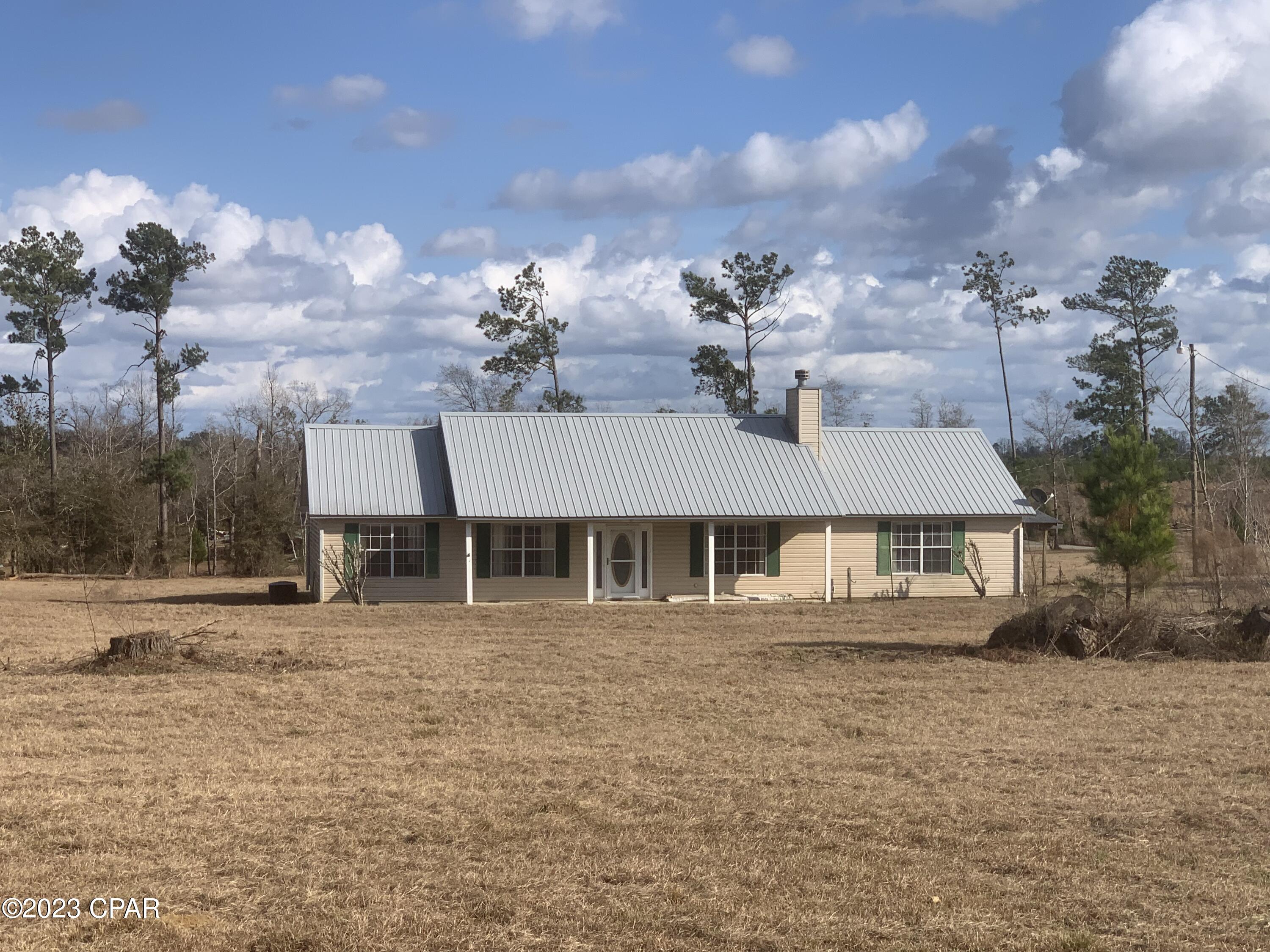 This house is what everyone is looking for!  4BR/3BA, 1,994 sq ft., split floor plan, and four acres with plenty of room for horses and barns. Conveniently located just 6.5 miles outside of Blountstown.  Only 44 miles to Panama City and 46 miles to Mexico Beach.  Call today to set up a showing.
