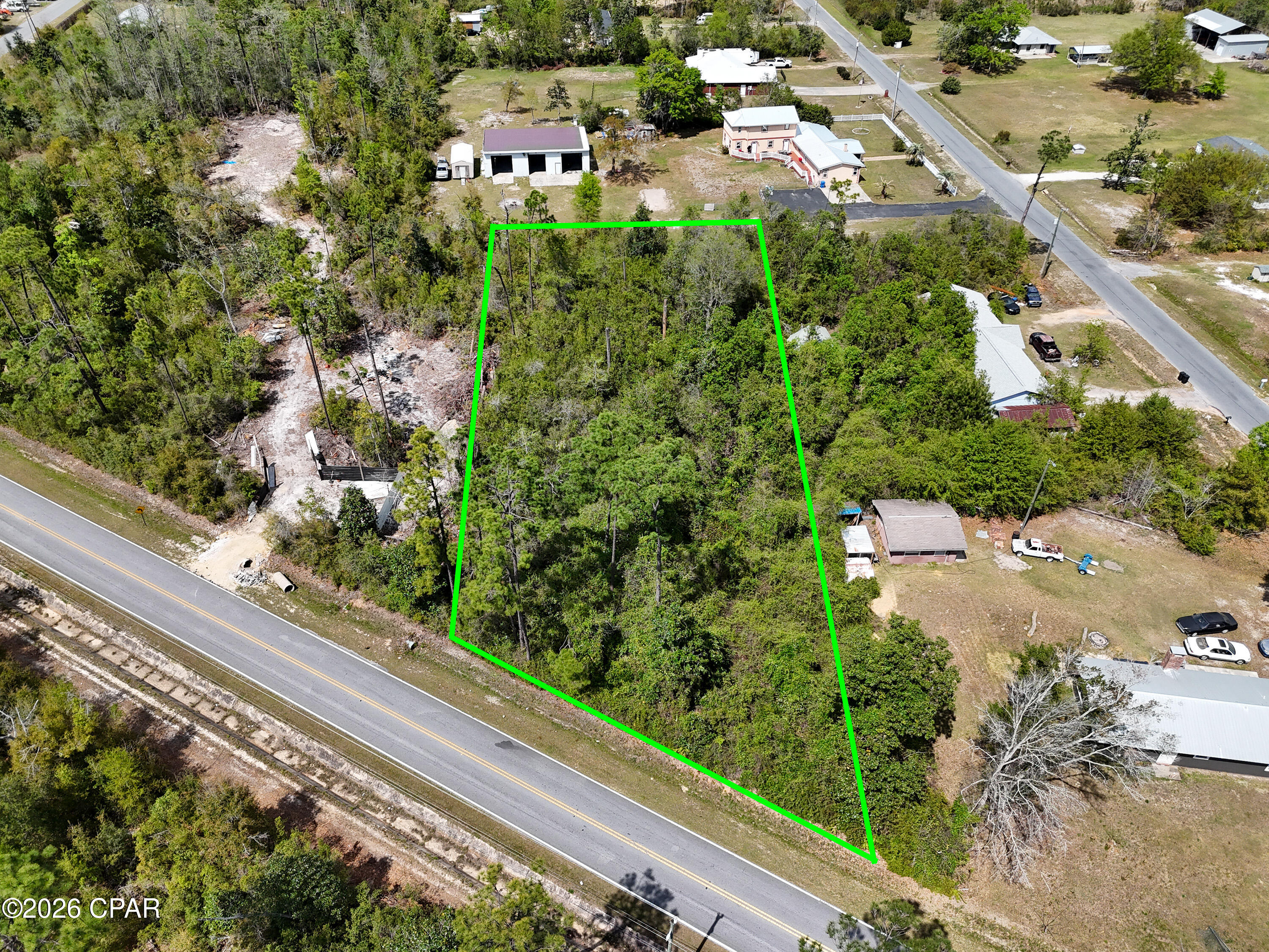 Welcome to 5413 Bayhead Road in Youngstown, Florida--a peaceful 1.04-acre homesite offering the perfect blend of rural country living and convenient access to nearby amenities. Nestled in the quiet Bayhead Estates area, this high and dry, level lot provides an ideal setting to build your dream home, place a manufactured home, or invest in a growing area of Bay County. With paved road access and plenty of space for a home, workshop, garden, or additional structures, this property offers the freedom and flexibility that comes with owning over an acre of land.

Surrounded by natural beauty and a tranquil setting, this property is perfect for those seeking privacy, space, and a slower pace of life. Outdoor enthusiasts will appreciate the close proximity to Deer Point Lake and nearby public boat launches, making it easy to enjoy fishing, boating, and other recreational activities just minutes from your doorstep.

Despite its quiet, country feel, the property remains conveniently located within a short drive to Panama City, where you'll find shopping, dining, and everyday essentials. It is also approximately 35 miles from the white-sand beaches of Panama City Beach and within a reasonable commuting distance to Tyndall Air Force Base. This property presents a great opportunity to enjoy the best of both worlds--peaceful rural living with access to the amenities and attractions of the surrounding area.