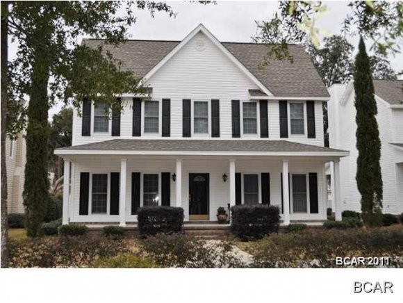 Tradition begins in this Riverside home. This is a home and community you will be proud to raise a family in; it's quiet with lots of amenities and southern charm. Welcome your friends and family alike from the large covered porch of this home. Everyone will feel quite comfortable in the living room complete with fireplace and shelves where you can showcase your favorite novels. Through the eat-in kitchen you can access the rear-grilling patio perfect for entertaining. There's more than adequate closet and storage space in the home, as well as an oversized two car garage. As mentioned, the Riverside community has many amenities. There's several common areas, a playground, a fishing pier on the bayou, community room, fitness center, two pools and a clubhouse. You're less than 10