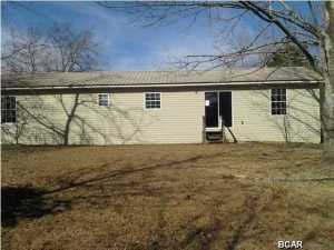 This is a wonderful location on this newer home. The lot is high and dry, over an acre and it is super convenient to schools, the interstate and Bonifay. The interior of home has lovely archways from kitchen to living and dining rooms. This home is a split bedroom plan.