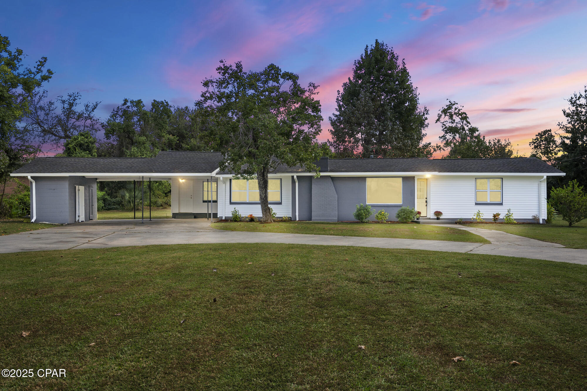 NEARLY 1 ACRE, WITH NO HOA! Beautifully renovated in a neighborhood near Tyndall Air Force Base. Offering the perfect combination of modern upgrades, spacious living, and expansive outdoor space, this move-in-ready property is a rare find.

Inside, you'll discover a bright open-concept floor plan with luxury flooring throughout, abundant natural light, and stylish finishes designed for both comfort and entertaining. The fully updated kitchen features granite countertops, custom cabinetry, and seamless flow into the living and dining areas, creating an inviting space for gatherings and everyday living.

Both bathrooms have been tastefully remodeled with contemporary fixtures and finishes, while the home's thoughtful renovations provide a fresh, modern feel throughout. A new roof installed in 2019 adds additional peace of mind.

One of the standout features of this property is the expansive 0.96-acre lot, offering endless possibilities for outdoor living, recreation, gardening, RV or boat parking, or future additions such as a pool, workshop, or detached garage. The circular driveway provides excellent curb appeal along with ample parking for guests and multiple vehicles.