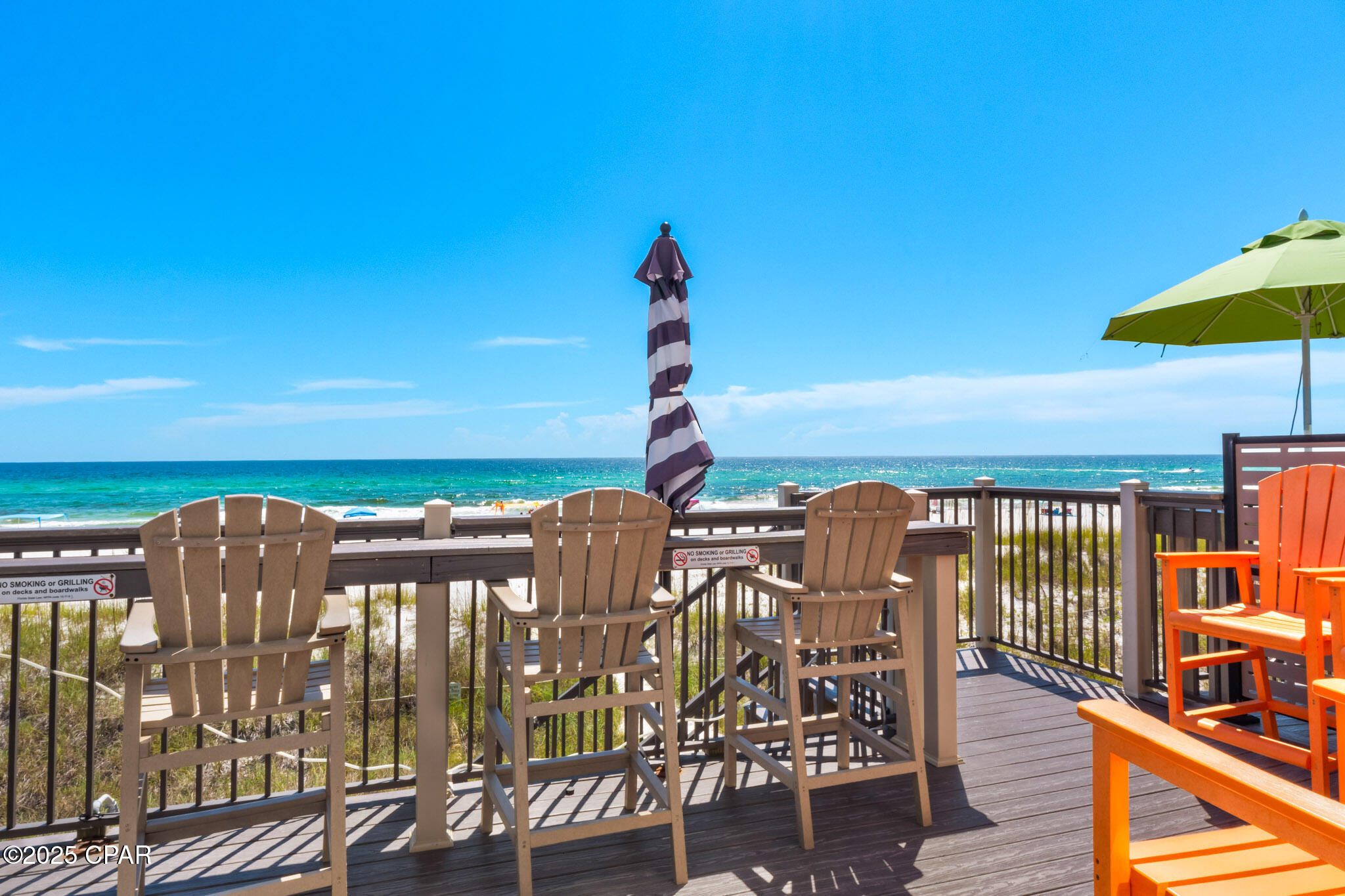 Imagine waking up to the sound of waves crashing just steps from your door, sipping coffee on your private balcony as dolphins play in the surf, and ending your evenings with breathtaking sunsets over the Gulf. This is the lifestyle awaiting you in this rare 3-story Gulf-front townhome that truly feels more like a private beach home. Experience true Gulf-front living with over 2,200 square feet, 4 spacious bedrooms, and 4.5 baths, designed for both relaxation and entertaining. The main level features an open concept with high ceilings, crown molding, and freshly updated LVP flooring. A well-appointed kitchen with granite countertops, stainless steel appliances, and plenty of cabinetry flows easily into the dining and living areas, where double sliding doors open to an expansive Gulf-front deck. A wet bar with wine cooler adds the perfect touch for entertaining. On the second and third floors, you'll find two Gulf-front master suites—each with private balconies and spa-like baths featuring large tubs, separate showers, and new vanities. An additional oversized en-suite bedroom provides space and comfort for family and guests. Every upgrade has been thoughtfully handled, including hurricane glass film protection on doors and windows, new Trex decking, fresh exterior paint, and updated HVAC systems. The exterior has undergone extensive replacement and waterproofing, ensuring durability and peace of mind. Step outside to enjoy the private Gulf-front pool shared by just five units, or take your own stairs down to the white sand beach. Perfectly located in the heart of Panama City Beach, you'll be just minutes from the best shopping and dining at Pier Park, family attractions like Top Golf and Pirates Voyage Dinner & Show, and only 15 minutes from the airport. This property is ideal as a luxury residence or a strong vacation rental investment. With 2 assigned parking spaces, 3 additional overflow spots, excellent rental history, and solid financials, this is a turnkey opportunity you won't want to miss. This condo is made to provide ample space and sleeping for large families! All engineering inspections have been completed as per new condo rules!! 

This rare opportunity combines low-density living with breathtaking Gulf views and modern updates throughout. Schedule your private showing today and start living the Gulf-front lifestyle you've always dreamed of!