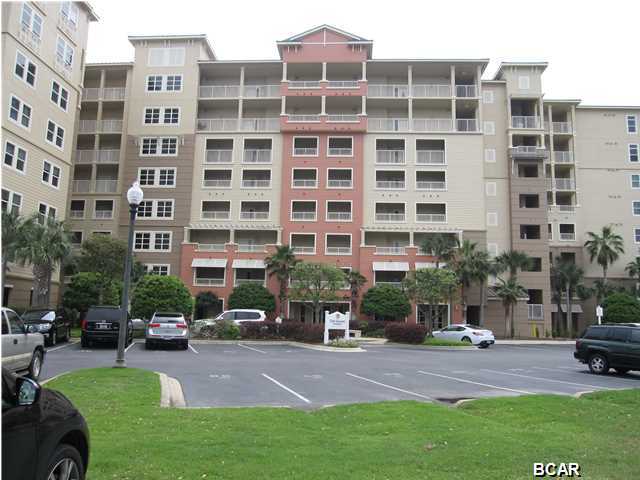 This is one of the largest units in Bay Point's newest and most luxurious complexes. Incredible views of the Grand Lagoon, the pass, Shell Island and the Gulf. Totally tiled floors (even the balcony), Granite in the kitchen and all baths, crown moldings, stainless appliances, and a private balcony are just a few of the unit's features. The Grand has a state of the art fitness room, heated pool, gas fire pit, hot tub, outside kitchen, covered patio area, and a large owner's room. See list of items which do not convey.