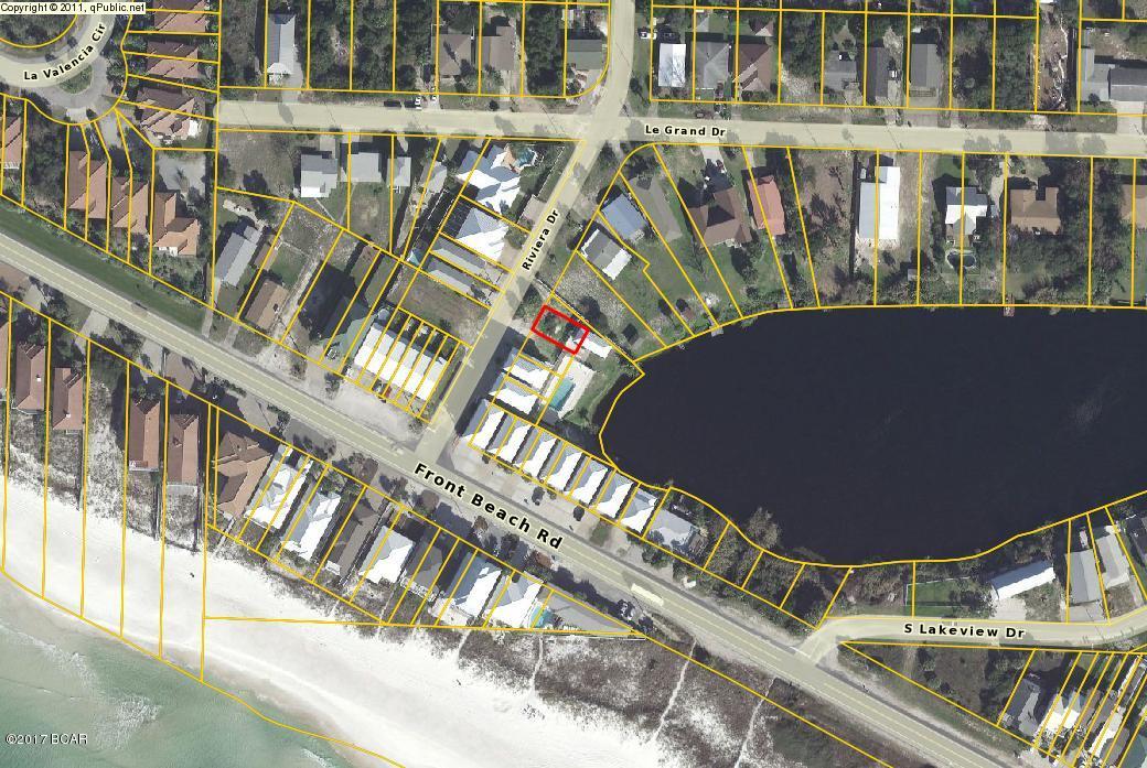 Build your dream home on the west end of PCB. Views of lake, pool and the gulf. Community has private beach access. Great opportunity to build a vacation rental property.
