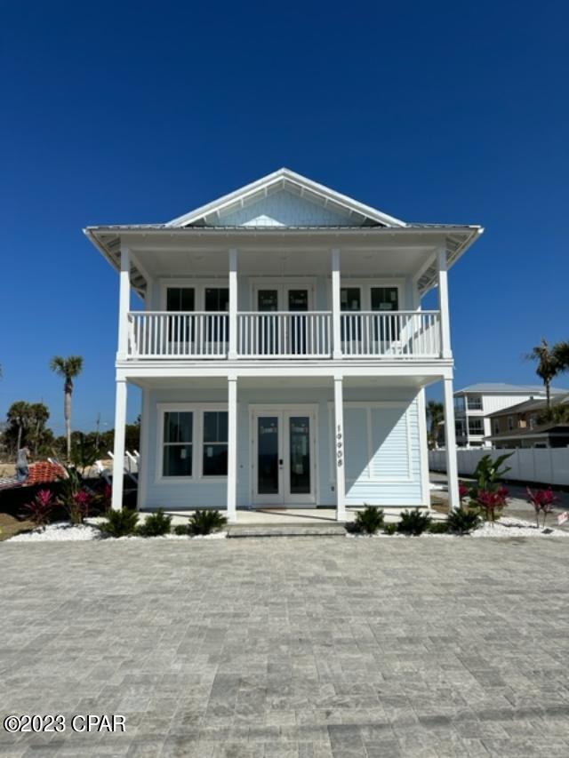 New Construction Coastal Luxury Home directly on Front Beach Road. Located on the West End of Panama City Beach in Laguna Beach. Great investment opportunity with a projected annual rental earnings of $187,000 plus. This 5 bedroom, 4.5 bath, 2-story,home has breathtaking views of the Gulf of Mexico. This home features a Chefs Kitchen with upgraded stainless appliance package, including a French Door refrigerator, gas cooktop, dishwasher, and wall oven/micro combo. Enjoy swimming in the Private, salt-water pool with gas pool heater. The home also boasts a gas tankless water heater, Hurricane, impact rated windows, Metal Roof, Hardie Siding, and 8' interior/exterior doors. There are Master suites on both levels, with an additional guest suite located on the upper level. This home's convenient location makes it a great income producing property or secondary home. Just steps to the White Sands and Emerald Waters of Laguna Beach and only minutes from Pier Park shopping, Dining and entertainment. Just East of Rosemarry Beach and 30A.