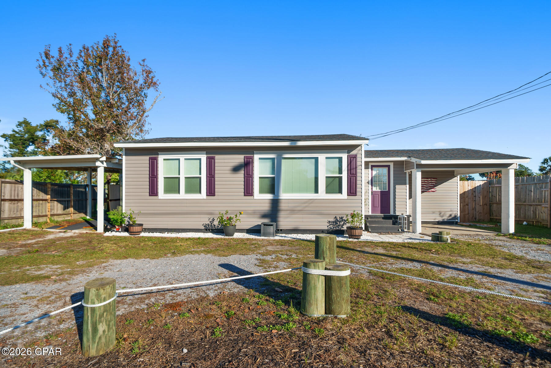 You'll love the timeless charm of this 1950 bungalow in the heart of St. Andrew's historic district.  This cozy 805+ sq ft, with extra rooms as well, FURNISHED 3 bedroom, 1 bath home sits on a quarter acre lot, is move-in ready and tastefully decorated. It's the perfect place to call home, or if you're interested in cash flow it will be a great rental for vacation getaways or long-term rentals. 
Outside, a generous circle driveway offers easy access as well as ample parking, complemented by TWO carports that are ideal for vehicles, boats or additional storage.  The privacy fenced yard has a double gate on one side & a single gate on the other to access the expansive backyard that provides plenty of room for outdoor living, gardening or future enhancements. 
This home is located minutes from local shops, dining, the waterfront, as well as entertainment.  The perfect balance of historic charm and modern convenience.  The potentials are endless, come see this home today!