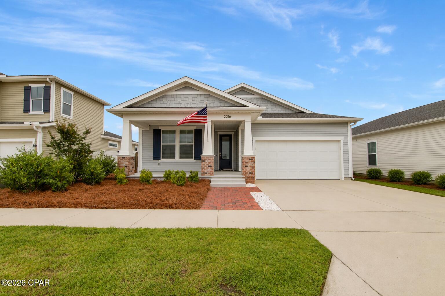 Welcome to 2216 Calamint Street in SweetBay! Featuring the Venice floor plan, this beautifully maintained 3-bedroom, 2-bath home with a den/flex room offers, 2,008 square feet of thoughtfully designed living space.

The open-concept layout features a spacious island kitchen with quartz countertops, stainless steel appliances, a gas range, tile backsplash, under-cabinet lighting, 42'' upper cabinets, and a huge walk-in pantry. The private owner's suite boasts a trey ceiling, tile-to-ceiling shower, and an expansive walk-in closet. Enjoy both covered front and rear porches, perfect for relaxing or entertaining.

Located in the highly sought-after SweetBay community, residents enjoy access to resort-style amenities including a junior Olympic pool, parks, sports courts, miles of walking and biking trails, and a community dock with Bay access for kayaking, paddleboarding, and fishing. Future plans include a marina and town center, while homeowners also benefit from priority access to top-rated University Academy.

Conveniently located near shopping and dining, this home offers the perfect blend of modern comfort and coastal community living. Don't miss out!