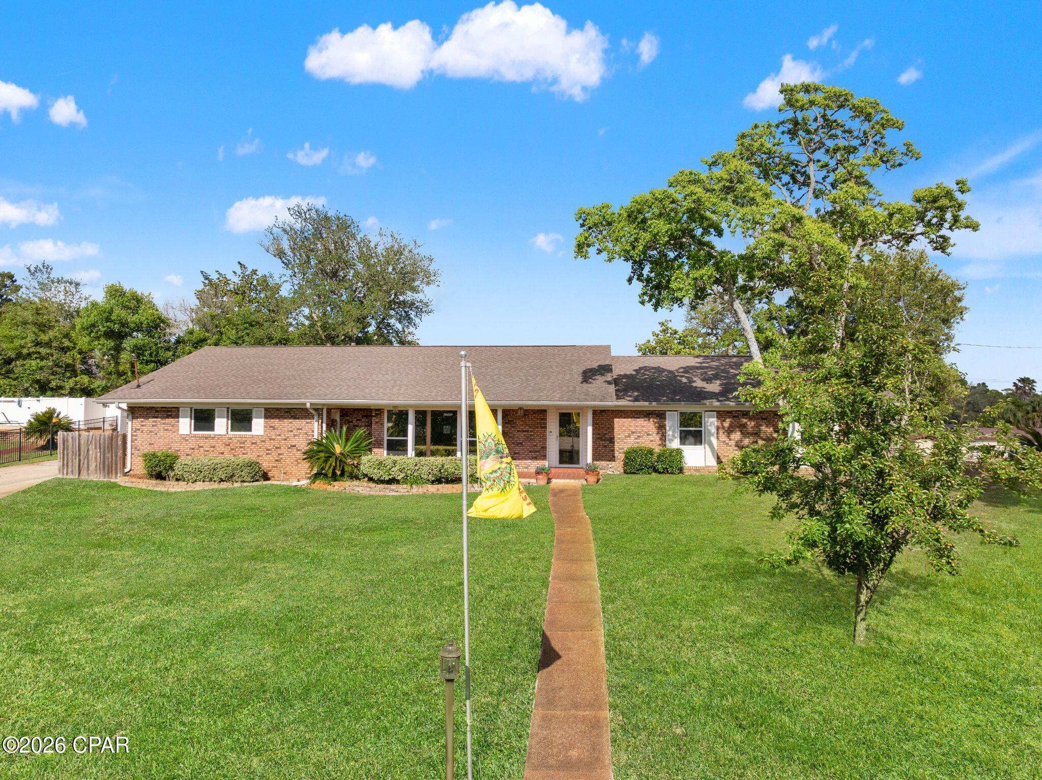 Perfectly situated on the desirable West End, this home offers the BEST VALUE PER SQUARE FOOT in the neighborhood! Sitting on a massive 0.45-acre corner lot with NO HOA and is SHORT-TERM RENTAL approved. This 4BR/2.5BA all-brick ranch is the ultimate Panama City Beach find for families and savvy investors alike! 

Step inside to a massive great room-an expansive central hub that flows seamlessly into a bright, modern kitchen featuring newer appliances, premium finishes and plenty of dinning space. Four bedrooms not enough? The large 16x16 bonus flex room provides endless versatility like a home office, playroom, or theater. Best of all, all FURNISHINGS currently in the home are included in the sale, offering a fantastic head start for a move-in ready residence or a high-potential vacation rental.

Major upgrades offer total peace of mind, including a 2018 roof, a mix of high-impact rated windows, and solar-tinted glass for maximum energy efficiency. Even the garage has been upgraded with a mini-split AC, creating the perfect climate-controlled space for a workshop or home gym.

Nestled in preferred Flood Zone X, this property is just a golf cart ride from the beach and around the corner from a coastal dune lake and the community playground. Only 1 mile from Pier Park, it delivers the space and versatility that is so hard to find in the heart of PCB. Call today for your private showing!

*Buyer to verify all information and measurements deemed important.