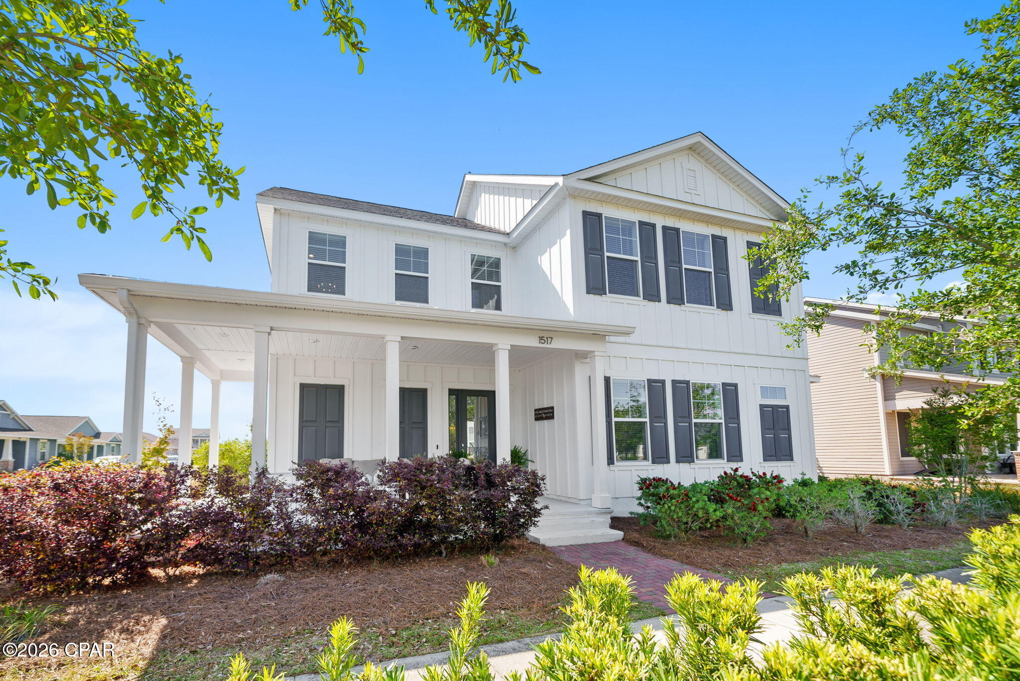 Welcome to one of a kind living in the highly sought-after SweetBay community! This beautifully maintained St. George house plan offers 5 bedrooms and 4 full baths, featuring a rare and desirable layout with a spacious primary suite on the main level-and includes an upgraded tub!

Enjoy classic charm and curb appeal with a stunning wrap-around porch, perfect for relaxing mornings or evening gatherings.

Designed for both comfort and style, this home includes a tankless water heater, upgraded GE Café appliances, and recent major improvements including a brand new roof, garage doors, and gutters. Step outside to your own private oasis with a sparkling pool and relaxing hot tub--perfect for entertaining or unwinding year-round.

Located in the vibrant SweetBay subdivision, home to University Academy Charter School, residents enjoy an unmatched lifestyle with incredible amenities: two community pools, sidewalks throughout, a basketball court, playground, beach access, and a boat dock. This is a true golf cart community where neighbors connect and kids are always out enjoying the neighborhood.

There's always something happening--from farmers markets to concerts and community events--creating an atmosphere that feels alive and welcoming every day. And the best part? You may never need to leave. Conveniently located just a short golf cart ride from Publix, Starbucks, and more.

Centrally positioned near both military bases, the beautiful beaches, and the lively areas of St. Andrews and Panama City, you'll have easy access to local eateries, marinas, shopping, and entertainment.

This is more than a home--it's a lifestyle. Come experience everything SweetBay has to offer and make it yours today!