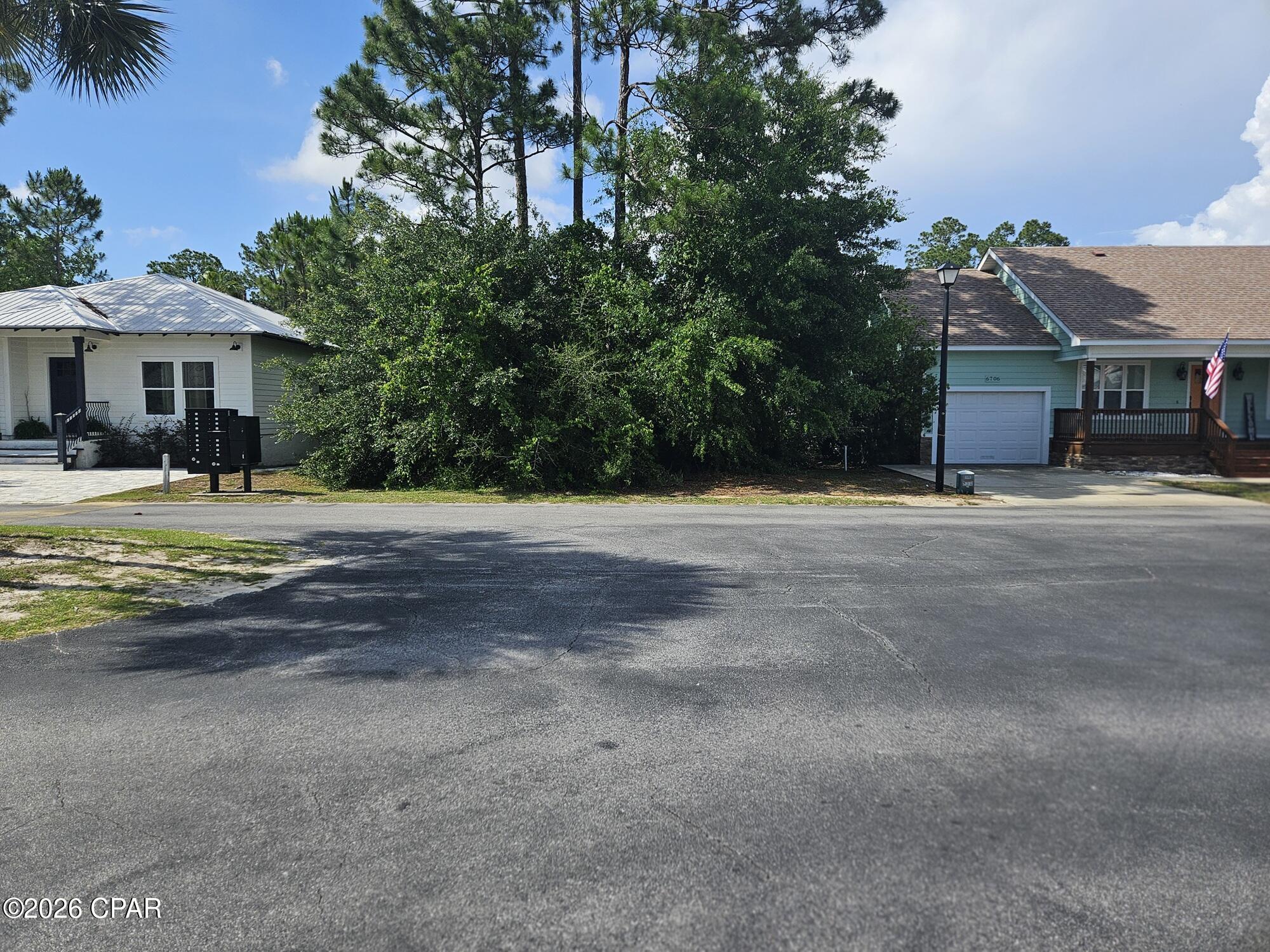 Excellent WATERFRONT residential building lot in a gated community with direct access to the Bay and the Gulf of Mexico for boating. On of the only remaining vacant waterfront Gulf Access lots in this subdivision. The lot sits in front of the first median cut in the main road so ingress and egress in and out of the project is quick and easy.  There are 2 nice pools and Pickle Ball Courts in the project. Houses are in the $500,000 to $700,000. price range. Excellent location for a investment or a primary or secondary private home. One the best prices for a waterfront property with access to gulf anywhere in the area.