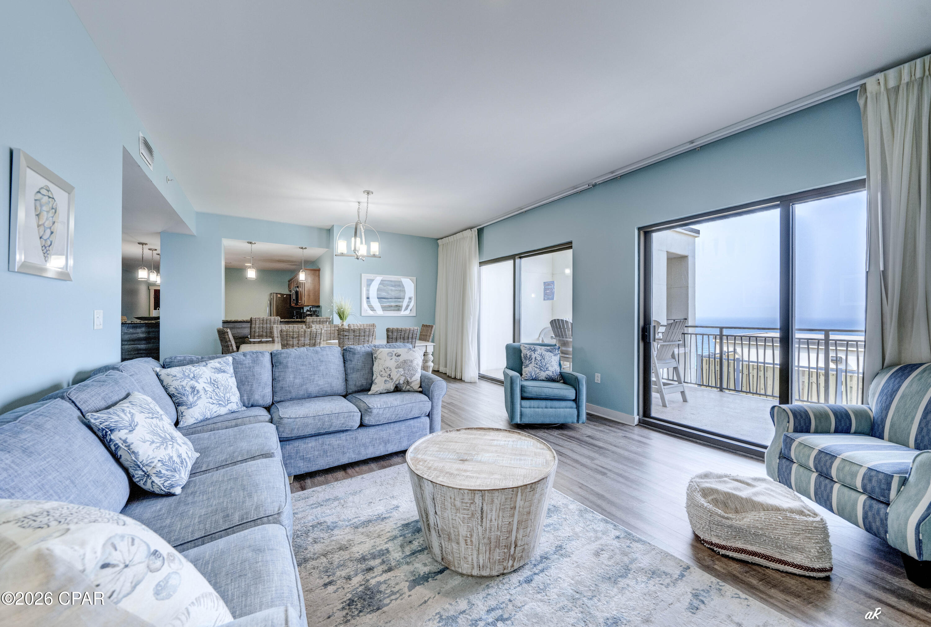 Step into coastal living at its finest with this spacious 3-bedroom, 2.5-bath condo perfectly positioned right across the street from the sugar-white sands of Panama City Beach. Offering a stunning, unobstructed Gulf view, this 1,963 sq ft residence blends comfort, convenience, and pure beachside charm.

Inside, you'll find a generous layout ideal for full-time living or a high-demand vacation rental. Three well-sized bedrooms, two full baths, and a convenient half bath create plenty of room for family and guests. Large windows bring in natural light and frame the beautiful emerald waters just steps away.

Location is everything -- and this one is unbeatable. Sharky's Beachfront Restaurant sits directly across the street, making sunset dinners effortless. You're also right in the heart of Panama City Beach's top attractions, entertainment, shopping, and nightlife, giving you instant access to the best the area has to offer.

Whether you're looking for a personal retreat or a strong investment property, this condo delivers the Gulf-coast lifestyle with style, space, and a view that never gets old.