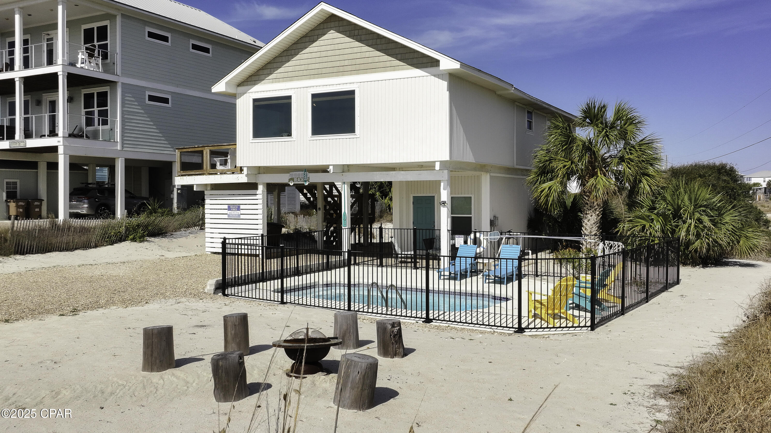 AMAZING WATER VIEWS!! Experience this fully renovated, boho chic ultimate beach cottage. Just steps from the pristine white sands & crystal-clear waters of the Gulf of Mexico! Step into this 3-bedroom, 2-bath home nestled on North Cape San Blas on Florida's Forgotten Coast. You're greeted with a bright & airy living/dining room with soaring ceilings & exposed wood beams with large picture windows that frame breathtaking views. The open-concept kitchen is well appointed with granite countertops, stainless steel appliances, and ample storage space. Outside, you'll find a large sun deck with amazing views where you can enjoy the endless sunsets and listen to the sound of the surf. Below you will find an inground pool surrounded by colorful Adirondack chairs, along with an outdoor firepit area, perfect for roasting marshmallows, lounging or enjoying the sunshine. An outdoor shower allows you to rinse off after a day at the beach. Fishing enthusiasts will enjoy a fish cleaning station & the outdoor propane grill, making it easy to prepare your fresh catch of the day. This fully furnished, rental-ready home with proven income potential presents a fantastic investment opportunity.  Downstairs has completely roughed in framing and electrical, as well as plumbing nearby for future expansion or the possibility of an outdoor kitchen area easily accessible to the pool. Cape San Blas offers a slower pace of life, where you can savor each moment—whether it's kayaking, paddleboarding, beach walks along the pet-friendly shoreline, nightly bonfires, or simply enjoying quality time with family & friends. The best feature about this location is the driving access on the beach is perfect for your golf cart and cruise anywhere you want to go. Be sure to explore the charming town of Port St. Joe, where you can browse local shops for unique finds or indulge in fresh seafood at a waterfront restaurant.  Check out the 3D tour & call for tour today!