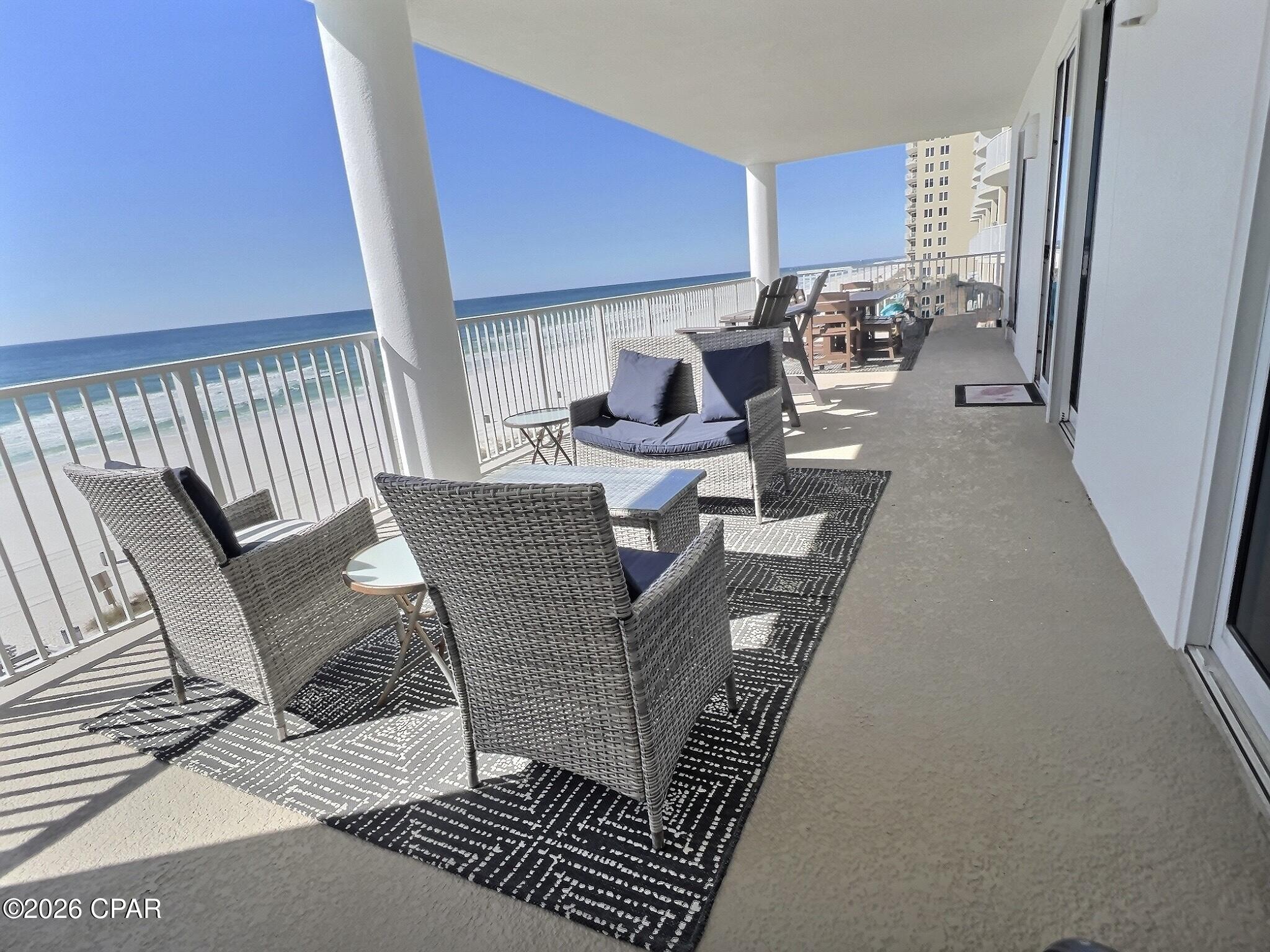 Ocean Ritz 503 offers the ultimate Gulf-front retreat with 4 bedrooms, 4 full bathrooms, including 2 Gulf-front primary suites, and an expansive 12.5' x 40' balcony designed to maximize the breathtaking Emerald Coast views. The living room and both Gulf-front primary bedrooms open directly to the oversized balcony through stunning floor-to-ceiling sliding glass doors, creating seamless indoor-outdoor living and filling the space with natural light and panoramic Gulf views. This beautifully maintained condo includes a highly desirable assigned covered parking space.

Updated in April 2020, the unit features new furniture, décor, and mattresses, creating a fresh coastal ambiance throughout. Major improvements include a complete HVAC system replacement in 2016 with an Airborne virus-killing blue light ionization air purifier, plus a new hot water heater and washer/dryer installed in 2019.

Ocean Ritz amenities include a Gulf-front pool, hot tub, fitness center, sauna, and steam room. Conveniently located near Pier Park, Shipwreck Island Waterpark, and St. Andrews State Park, this spacious beachfront condo is ideal as a primary residence, second home, or investment property - offering luxury, comfort, and convenience in the heart of Panama City Beach.