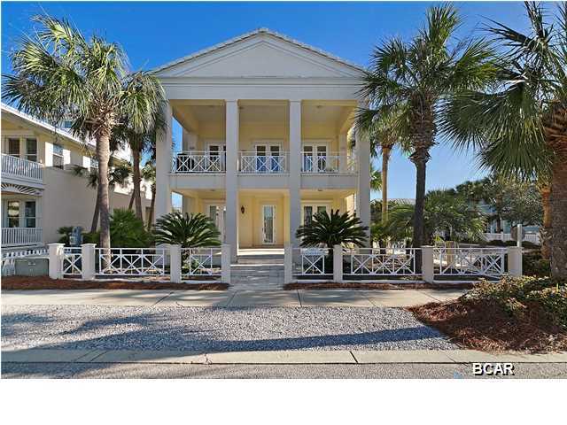 321 Beachside Drive, located in Carillon Beach, is a spacious, well laid out home directly across the street from the Gulf of Mexico. The house has a reverse floor plan allowing Gulf views from the living room and front porch. The open kitchen, master bedroom/bath and a half bath are on this floor. The lower floor has a den/tv room and three bedrooms and two full baths. There are 4  spacious porches on this home for an abundance of outside living space. The Walkway to the Gulf is directly in front of this home and the Gulf front pool is near by. This home is oversized for this lot and you would not be allowed to built this large a home today. The corner lot provides plenty of extra street parking. This home is not a rental but could be, or a wonderful second or primary home. There's nowhere more idyllic than Carillon Beach, with its beautiful scrub oaks, intimate eateries and charming boutiques, and long stretches of quiet white sand beach. Enjoy the scenic centerpiece of tranquil Lake Powell, one of the area's largest coastal dune lakes. Family friendly amenities include a pavilion, gazebos, picnic areas, playground, tennis courts, naturally landscaped parks, three swimming pools, a wide variety of shopping and dining, plus 24 hour security gate. The location of Carillon is unbeatable - just 10 minutes to Panama City Beach's exciting west end and Pier Park, plus a short 20 minute drive to Sandestin and its Outlet Malls and world class dining, shopping and entertainment. This is a wonderful opportunity to purchase a Carillon Beach home and start living the good life, whether year round or as a vacation getaway!
