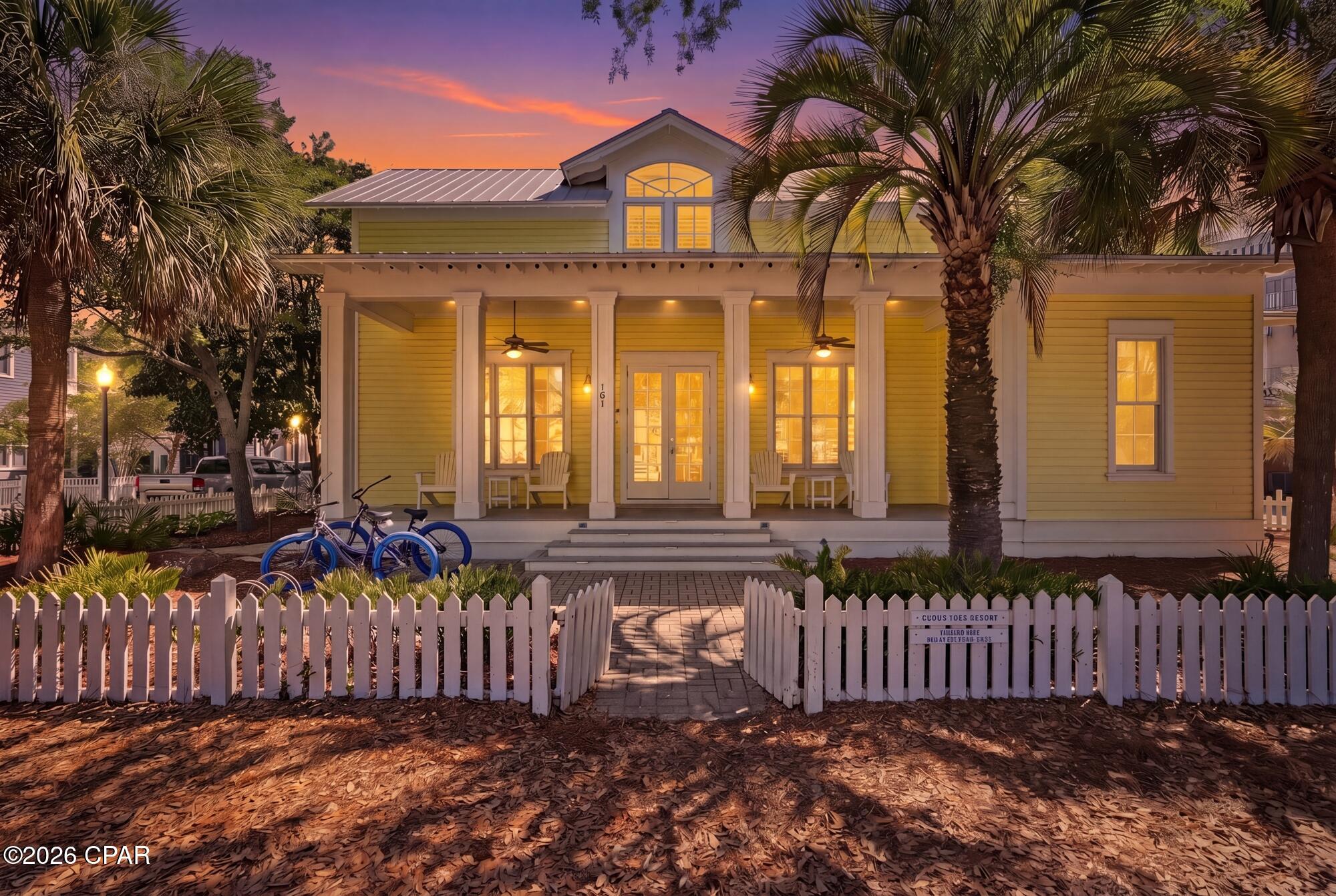 Your Florida beach-town daydreams are realized in this quintessential residence now available in Seaside. This home boasts shaded porches, an ocean breeze, swaying palm trees, a yard swing and a sweet picket fence. Positioned on a corner lot, this location provides easy walkability to gathering areas, food trucks and public beach access.  For accommodations, you'll find three bedrooms, two of which are on the main floor and an additional third bedroom upstairs.  There's even a bonus bunk room tucked into the 2nd floor! A bathroom for each bedroom is found on the main level, as is a guest half-bath.  A spacious full bathroom on the 2nd floor provides convenience.  Relax after a day on the sand in the cozy living room that connects with the kitchen.  There are also a convenient laundry closet, outdoor shower and grilling space to complete this residence. What else is needed?  Pack your flip-flops and start enjoying the Florida lifestyle, today!  Property sold ''As-is''. Buyer and/or buyer's agent responsible for verifying all pertinent information deemed relevant by the prospective buyer, including but not limited to square footage, acreage, utilities, taxes, zoning, permitting, condition, school zones, HOAs, etc. Unauthorized photography or video recording of this property is strictly prohibited. This property is owned and controlled by the United States of America, and any recording without prior written authorization from the appropriate federal authority is not permitted. Violation of this policy may result in removal from the premises and potential legal consequences under applicable federal laws and regulations.
