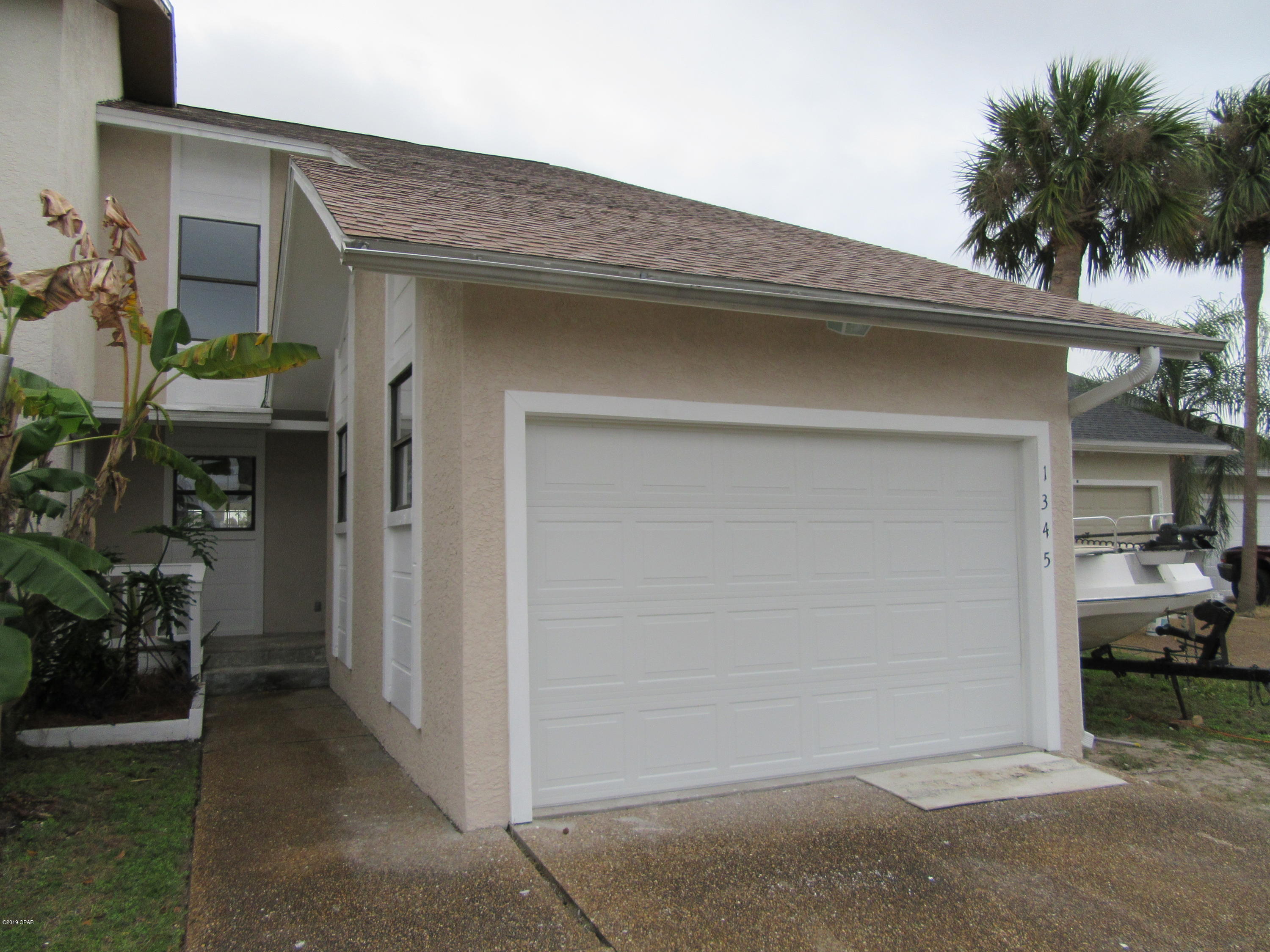 Waterfront 2 story townhome on a canal located in the much desired community of Venetian Villa in Panama City. This beautiful tastefully remodeled 3 bedroom 2.5 bath townhome is convenient to shopping, dining, the best schools and centrally located to the Worlds Most Beautiful Beaches and Military Installations. Improvements include but not limited to, new wood plank flooring, new paint, trim, upgraded fixtures, granite, and back splashes. Living area is a very large open space with a fireplace focal point and a island wet bar for entertaining. All property sizes and ages are approximate, please measure and/or verify if important. School assignments are subject to change, please check with Bay County for most accurate information. Deposit is the same as the rent. Pets allowed. Breed restri