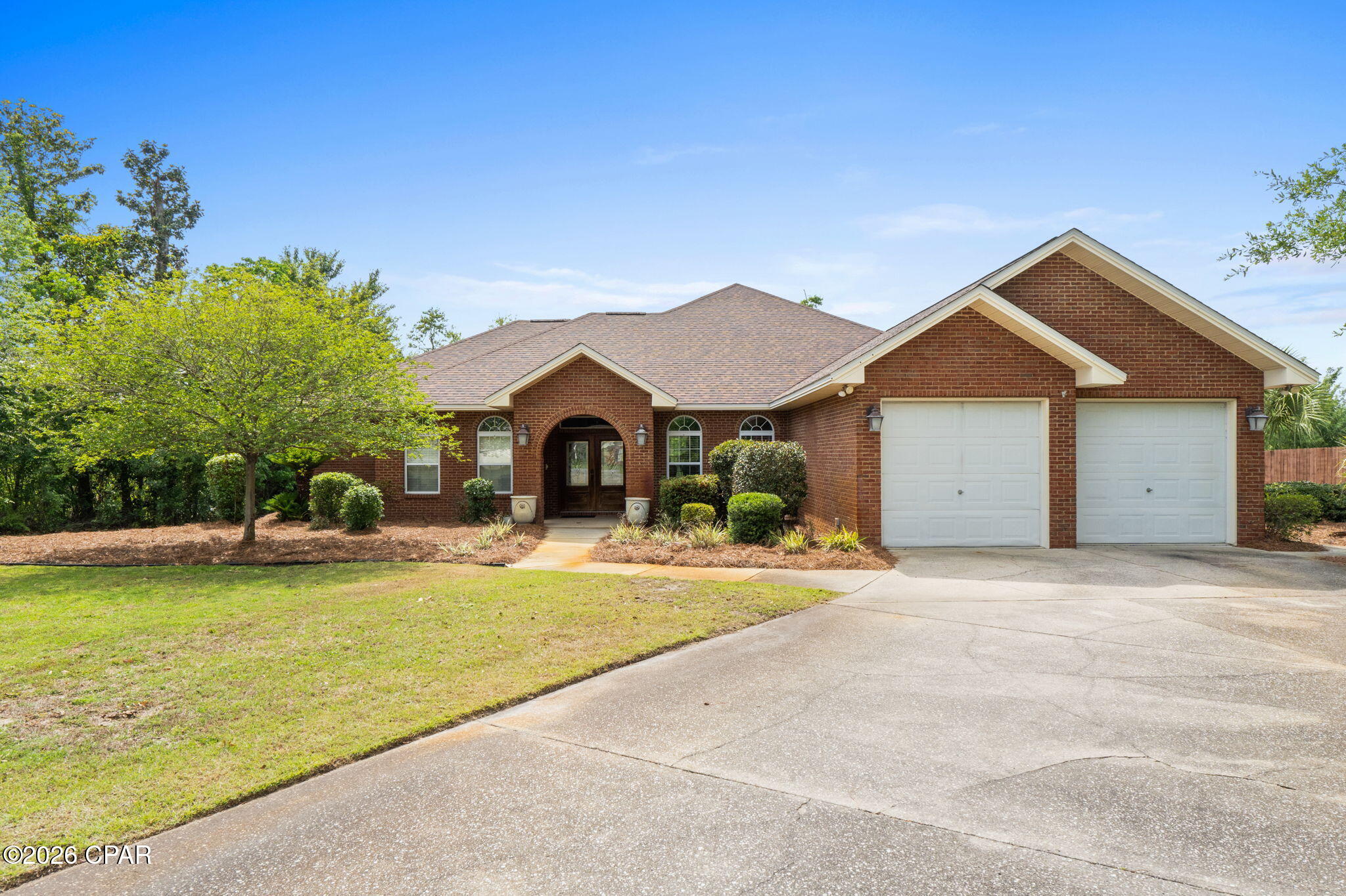 'CURRENTLY UNDER CONTRACT, SELLER WILL CONSIDER BACKUP OFFERS' Welcome Home! A stunning all-brick estate offering the perfect blend of timeless elegance, peaceful living, and modern comfort. Situated on over an acre of beautifully maintained property, this spacious 3-bedroom, 2-bathroom home boasts approximately 3,040 square feet of thoughtfully designed living space filled with character and charm.

Inside, you'll find elegant finishes throughout, complemented by beautiful antique fixtures that add warmth and sophistication to the home's unique character. Whether entertaining guests or enjoying a quiet evening in, this home provides an inviting atmosphere with generous living spaces and refined details at every turn.

Just outside of the fully heated and cooled Florida Room, Step into your own private retreat featuring a sparkling in-ground saltwater pool, perfect for relaxing after a long day or enjoying sunny Florida afternoons. Gather with friends and family around the custom paver fire pit area and create unforgettable memories under the stars.

For those who appreciate waterfront living, this property backs up to a canal with Gulf access and offers incredible potential for your very own private dock -- making it ideal for boating enthusiasts and anyone who enjoys life on the water.

Additional highlights include a new Culligan water filtration system, providing enhanced water quality and peace of mind.

Combining privacy, space, waterfront potential, and timeless style, 1112 Paton Lane offers a rare opportunity to own a truly special property in one of Bay County's most desirable areas.