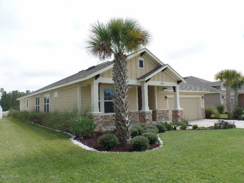 The 4 bedroom, 3 bath spacious SKYVIEW plan is one of the most popular David Weekley floor plans. In a very popular neighborhood and also in a wonderful location, this is THE ultimate plan for easy living. As you enter through the front door of 610 Breakfast Point Blvd, you will first notice the extra wide hallway with beautiful arches. Take an immediate left and you will see a front bedroom next to a full bath which is a perfect private area for guests. The office is next but could even serve as another small bedroom or bonus area. 2 more bedrooms, the laundry room, and a full bath are across from the office. Moving on down the hall is a dining area. Be sure to notice the beautiful crown molding and large squares of tile in this home. You are almost to the fabulous kitchen with its oversized granite island and breakfast bar, recessed lights, gas stove, built-in desk, and pretty backsplash. There is a large pantry along with plenty of cabinets for storing all the groceries and dishes you need. There is also an informal breakfast area next to the screened in back porch. Watch TV or relax in the large family area before retiring in the super Master Bedroom with Trey Ceiling. The attached awesome Master Bath has a garden tub and a separate shower, 2 vanities, and a huge walk in closet for your wardrobe. Schools are very close and shopping can be reached in minutes. Need more details? Seeing is Believing! Check it out! No need to purchase window treatments or appliances. Blinds are on the windows, and the appliances are all there.