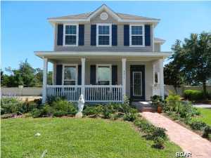 Lease or Lease Purchase Opportunity. Rent-To-Own in this Bay Front Gated Neighborhood! This is a brand new 2-Story Coastal Craftsman Bungalow Home for sale in Panama City Beach. A large corner lot tucked away on the west side of the property. You will notice the southern charm right away in the Ole Southside floor plan which offers a breezy verandah on the front and wraparound back porch. The downstairs hosts the living room, dining room, half bath and sleek kitchen with eat-in breakfast area. A rustic hardwood covers the first floor and carpet on the second. Upstairs is a super spacious master suite with sitting area, walk-in closet and private bath. Both additional bedrooms are nice sized and share a hall bath. Note various upgrades throughout such as gas stove, Rinnai hot water