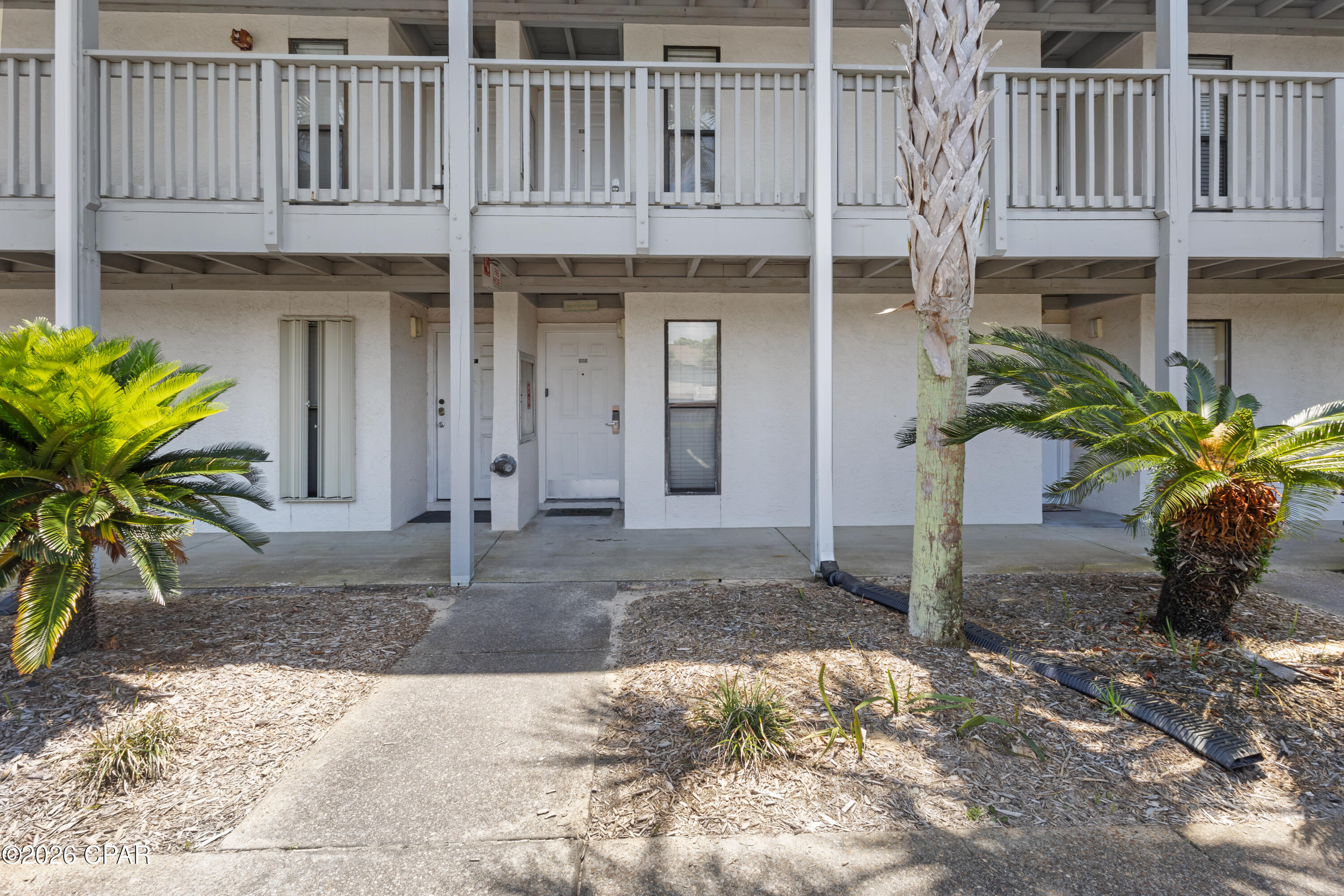 BEAUTIFUL GROUND FLOOR UNIT -- Patio is steps away from the North Pool! Endless Summer Condo--Ideal location on the peaceful West End of Panama City Beach -- one of the lowest HOA fees on the beach! Amenities include: clubhouse-- two community pools -- BBQ grills --Owner Pet Area--Pickleball--Shuffleboard--Ample parking -- fully fenced low-rise complex without elevators--Relaxed Residential Vacation Feel. Turnkey furnished, Professionally Managed rental, Generating income. Homestead, vacation home, second home, or investment rental, this unit qualifies for most Financing. Just minutes from Shopping/Restaurants/Two Beach Access points: Beach Access 70 & 71. All info approx.; buyer to verify everything deemed important. Call today and see why Endless Summer F2 is the one you have been looking for!