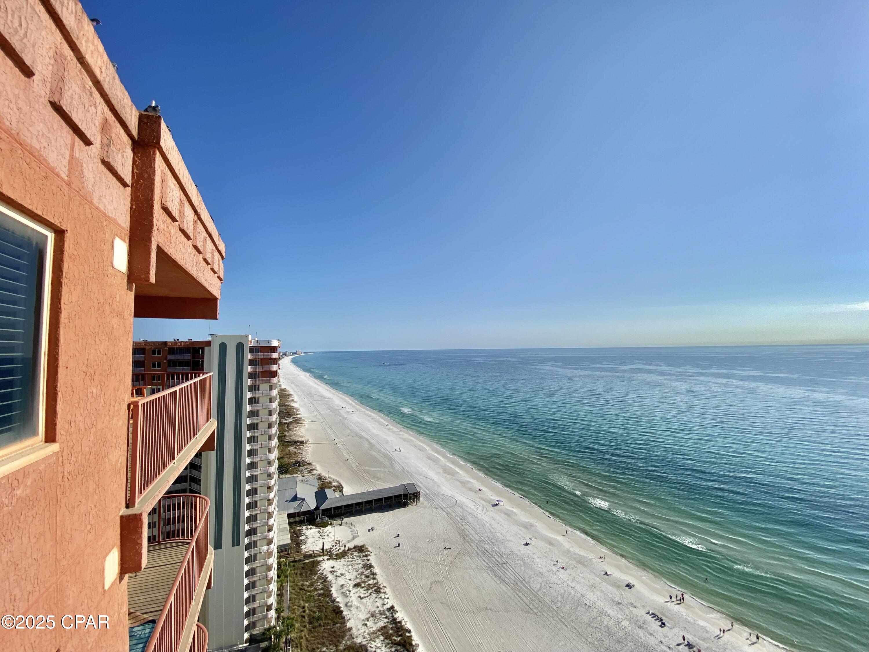 OWNER FINANCING AVAILABLE ASK FOR TERMS! AMAZING VIEWS FOR MILES! 23rd Floor Gulf Front Penthouse Condo in Shores of Panama.
You won't find better views and large balcony for this price! This Top Floor Penthouse unit sleeps 6 and has one full bedroom and bath, bunk room and bath, spacious living room/dining area and modern kitchen. Kitchen has granite countertops, stainless steel appliances, updated cabinets and is fully stocked for the upcoming rental season. Also comes Fully Furnished so turnkey ready to go! Lush Landscaping, Dolphin Fountains and pool space galore! Shores of Panama is a 23 story Tuscany style condominium. The complex offers amenities including around 500' feet of Gulf frontage, 14k square foot Gulf-side, zero entry gulf side pool, hot tub, heated indoor pool & hot tub, covered on-site parking garage, fitness center, two full-service bars serving lunch and dinner, beach events and rental services, high-speed internet access, and more! Buyer and Buyers agent to verify all dimensions and anything deemed important.