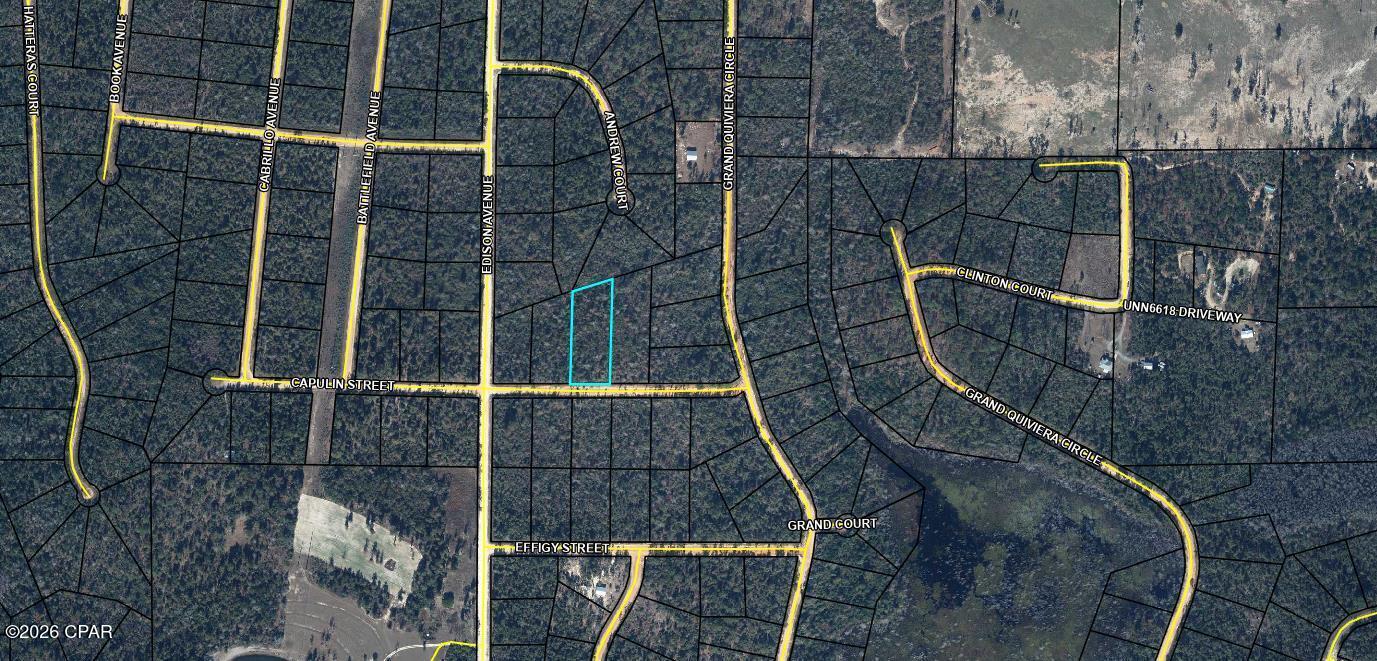 Beautiful lot to either build your dream home or place your new manufactured home in the unique community of Compass Lake in the Hills.  No mandatory HOA but if you choose to be a member you will have access to all the amenities that the association offers. These include swimming pool, tennis courts, cabin rentals, RV spaces, and more. Quiet, peaceful country living, yet still a reasonable commute to Panama City and all that is offered there. All measurements are estimates to be verified by buyer.
