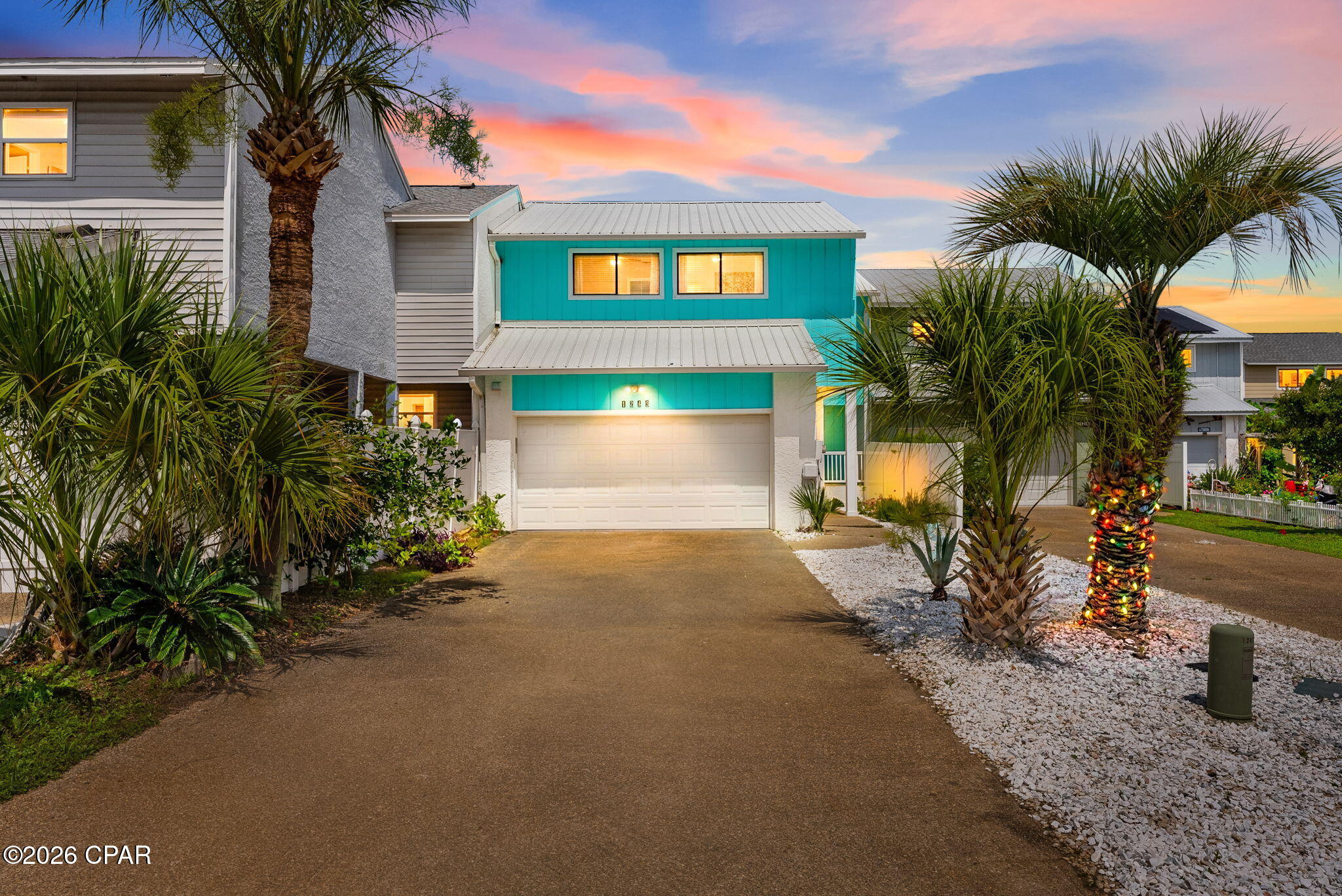 Welcome to your dream home at 1243 Capri Dr, nestled in the charming Venetian Villa neighborhood! This stunning townhouse captures the heart with an open floor plan, offering a seamless flow that makes entertaining a delight. As soon as you step inside, you'll be greeted by spacious living areas adorned with fresh paint and a cozy wood-burning fireplace, perfect for those chilly evenings or quiet gatherings.

This home features three inviting bedrooms and two and a half thoughtfully designed bathrooms, including a beautifully remodeled primary bath that boasts modern fixtures and a serene ambiance. Imagine soaking in comfort and style, starting your day with a splash of luxury!

One of the standout gems of this home is the delightful screened-in Florida Room. Picture yourself sipping your morning coffee in this tranquil space, surrounded by the gentle Florida breeze. It's the ideal spot to unwind after a busy day, entertain friends, or host delightful evening gatherings.

The property also provides a spacious two-car garage, ensuring you have ample storage and convenience for all your needs. Plus, the impressive dock with a 10,000-pound boat lift built by RJ Gorman Marine Construction will make any boating enthusiast swoon. Enjoy easy access to the bay, whether you're fishing, cruising, or simply soaking up the beautiful views.

The location couldn't be better! Just six miles from Gulf Coast State College and FSU, this home is perfect for those who love to be close to academia without sacrificing the relaxing coastal lifestyle. And let's not forget, you're just 30 minutes away from the stunning white sand beaches of Panama City Beach! Whether it's a day of sun and surf or a short drive to nearby shopping and restaurants, your options for fun and relaxation are endless.

What's more, this community shines with freshly paved roads, elevating the charm and accessibility of Venetian Villa. AND with deeded riparian rights, this home isn't just a dwelling; it's a lifestyle waiting for you to step in and enjoy. Don't miss your chance to embrace this enchanting oasis! Contact your favorite Realtor today to make this dream home your reality.
