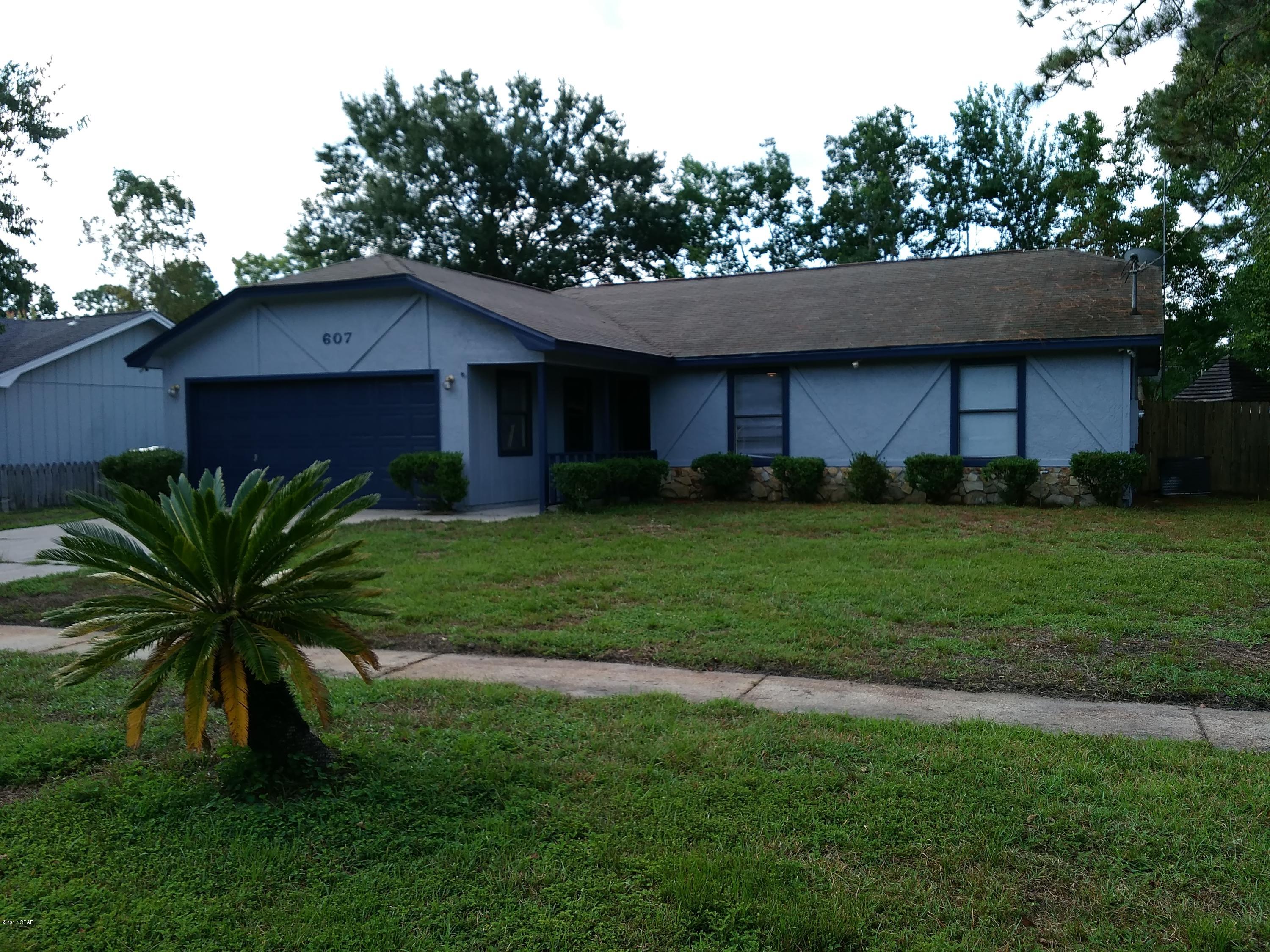 Newly renovated 3 or 4 bedroom home. Bonus room is part of the converted garage, this room does not have a closet, but is large enough to be a 4th BD or office or playroom. Just painted inside & out, kitchen cabinets re-finished, stainless appliances, brand new plank flooring, ceramic tile, no carpet in home.  Fenced back yard, storage area in garage plus a storage room built into back of the house, covered back porch, gazebo.  In popular Lynn Haven, convenient to everything!