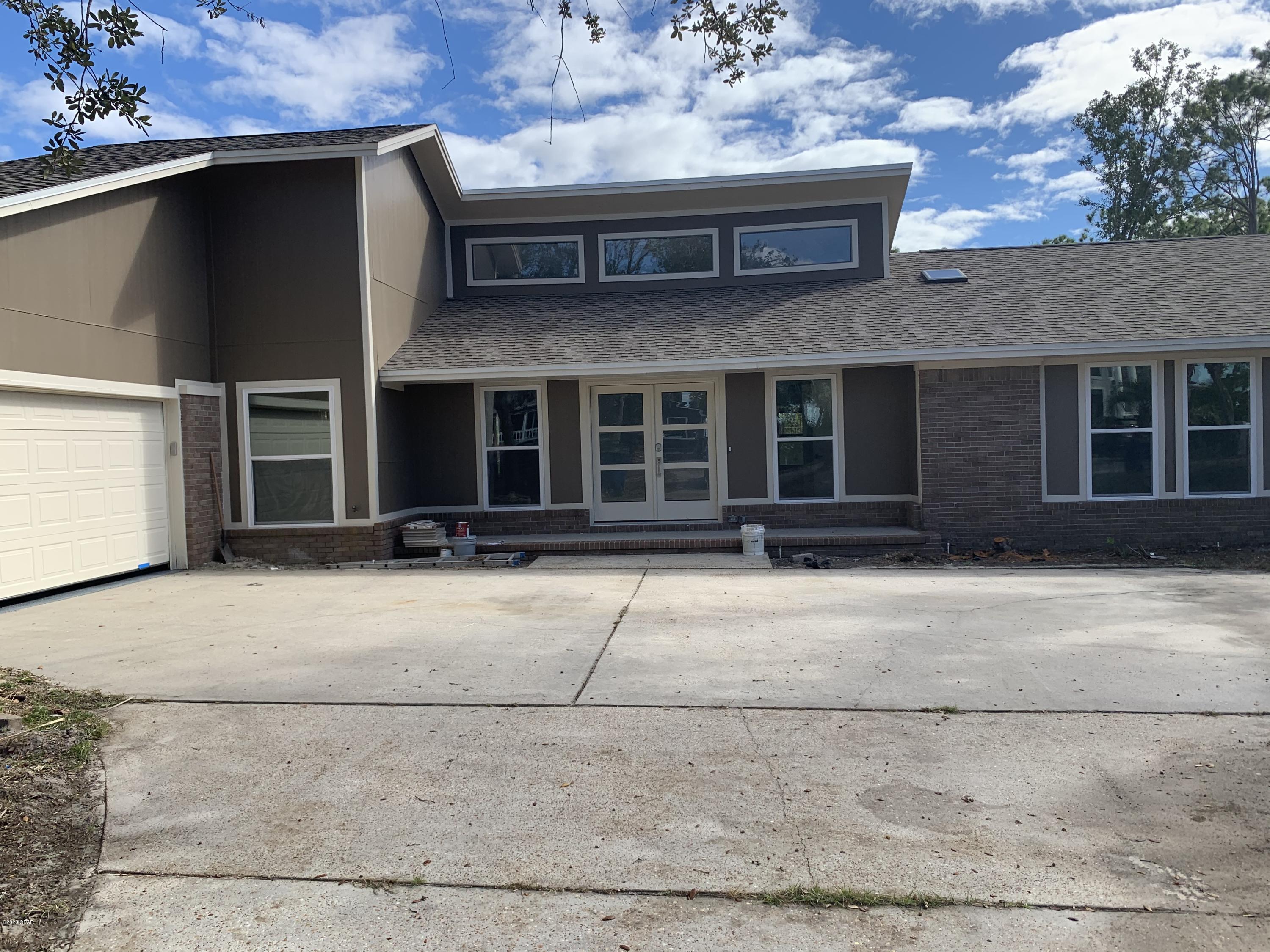 This home has been totally remodeled with granite counter tops. new stainless appliances, new flooring and repainted. It is in a great neighborhood and is across the street from St Andrews Bay.