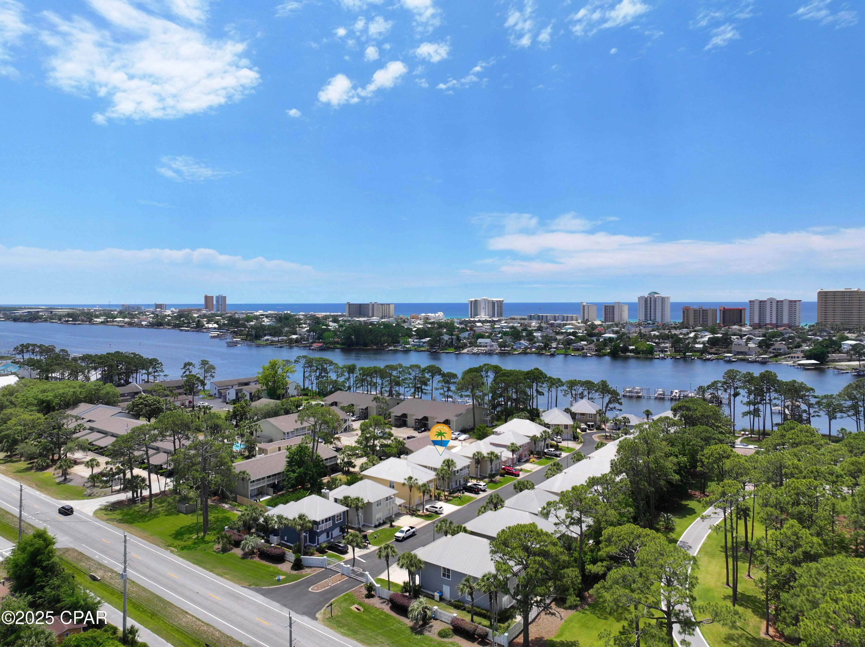 REDUCED! MOTIVATED SELLER! HOA IS 800.00 a quarter.This is a beautiful updated home on North Lagoon! This home is packed with value, comfort, and coastal living perks. Located in a very desirable neighborhood with low HOA dues, community pool, and a club house for entertaining. Boat slip included with a lift. Hop on your boat and spend a day of fishing in the gulf or a day at Shell Island. House includes a 7 person hot tub. This neighborhood is in a great location on the popular street of North Lagoon. Insidethere are many updates. In 2024, $30,000 was spent on new impact windows creating energy efficiency and storm protection. Home includes a Tankless gas hot water heater, gas stove, and gas fireplace.  There is a 16 seer AC unit (2019) and 2.5 ton heat pump system for the downstairs(2023).
Down stairs has a very spacious living area and a remodeled kitchen and a nice dining area, perfect for all gatherings. This 3 bedroom 2.5 bath home has a large bonus room with a cozy sunroom attached, ideal for family fun, a home office, or a guest space. Don't miss this opportunity to own a move in ready home with many upgrades with waterfront access.
All measurements are approximate. Please measure if important.