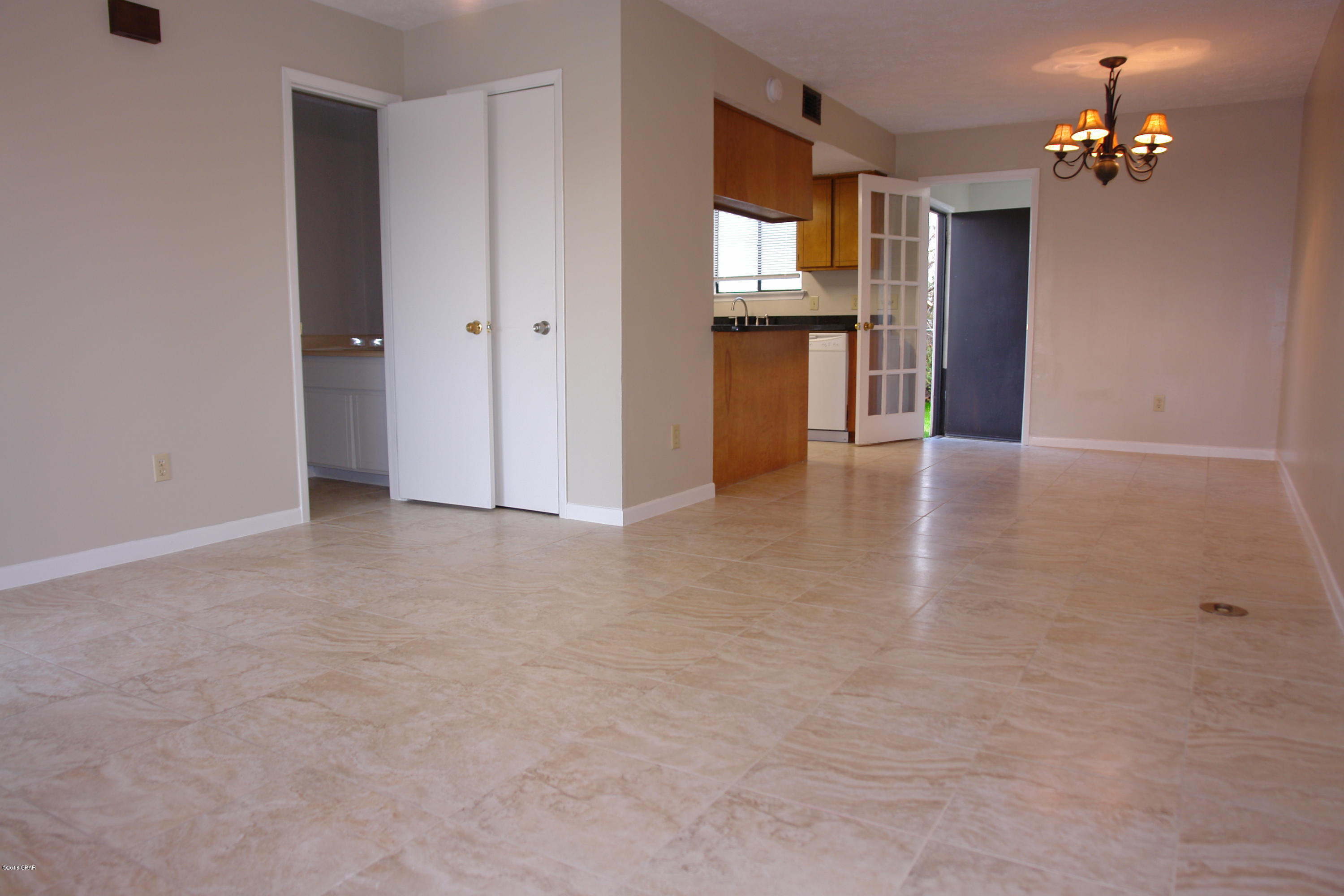 MOVE IN READY home with upgrades throughout! This home was not damaged by the Hurricane at all, however recent upgrades include a four year old roof, 16'' tile, Water Heater, HVAC, Kitchen Appliances & Granite. This unit has also just been completely painted inside and new carpet in the bedrooms! This unit features an over-sized laundry room with full size washer/dryer, lots of storage, fenced in back yard, and a community park for all the residents! Pets may be negotiable with a non-refundable pet deposit.