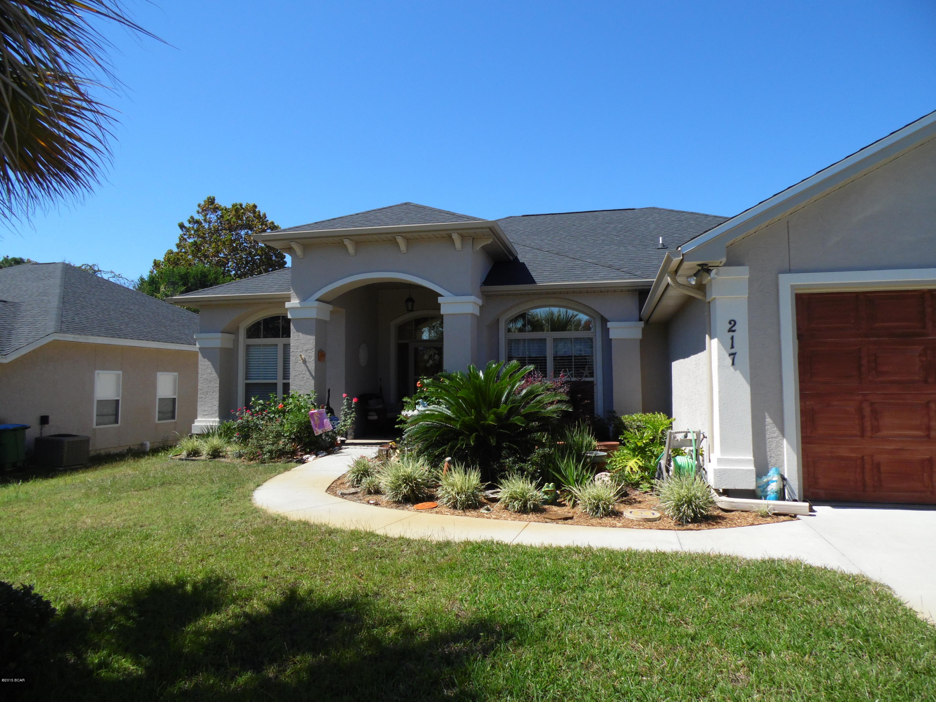 One owner home in Summer Breeze having 10' ceilings.Completed in January 2012. This four bedroom two bath has all ceramic tile in living area, kitchen and baths. Bedrooms have carpet. In-ground screen enclosed pool. Pool is 10'x27'. Covered patio over-looks pool. Endless gas hot water. Jacuzzi tub and separate step in shower and double vanity in master bath. All appliances convey. Short walk or drive to the Beach. Sprinkler system. In flood zone A. Flood insurance required.
