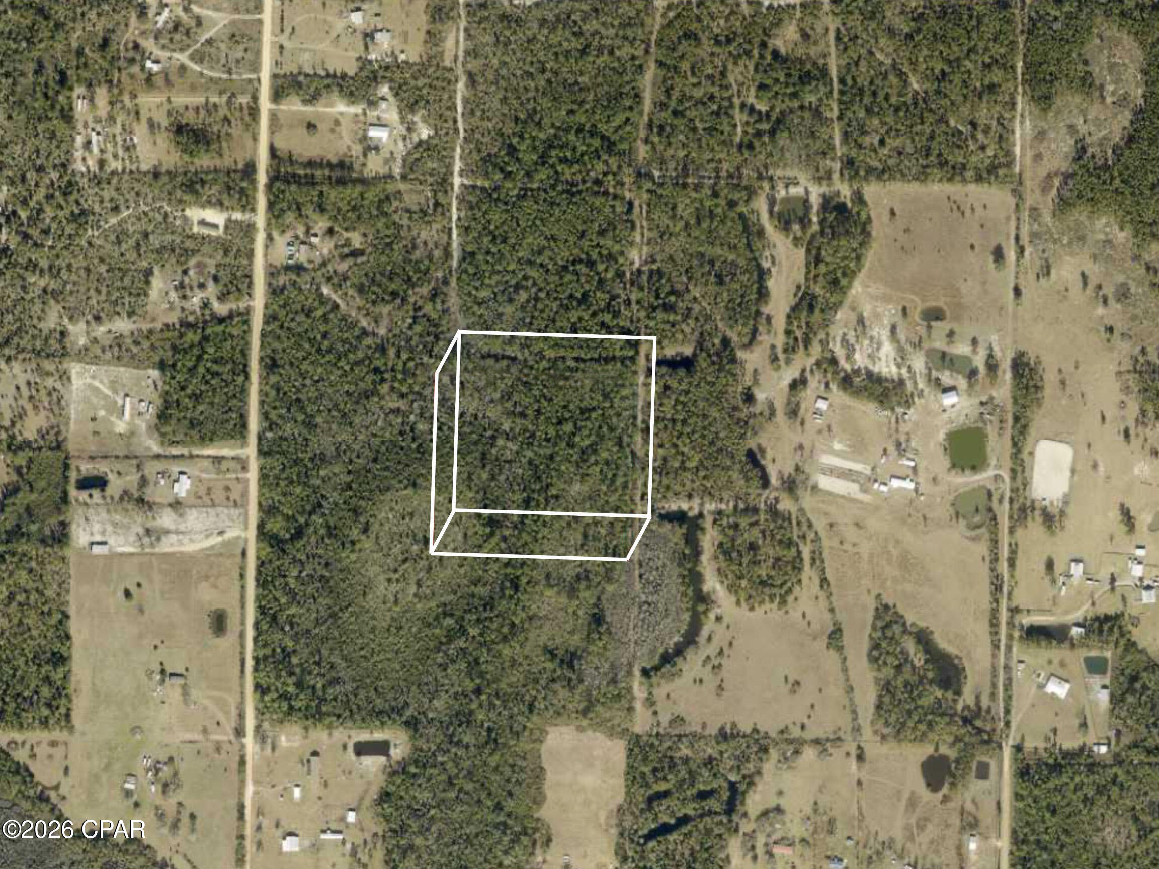 Secluded 10 acre vacant land offering a mix of buildable area and natural woodlands. Ideal for agricultural use, recreation, or a private homesite.