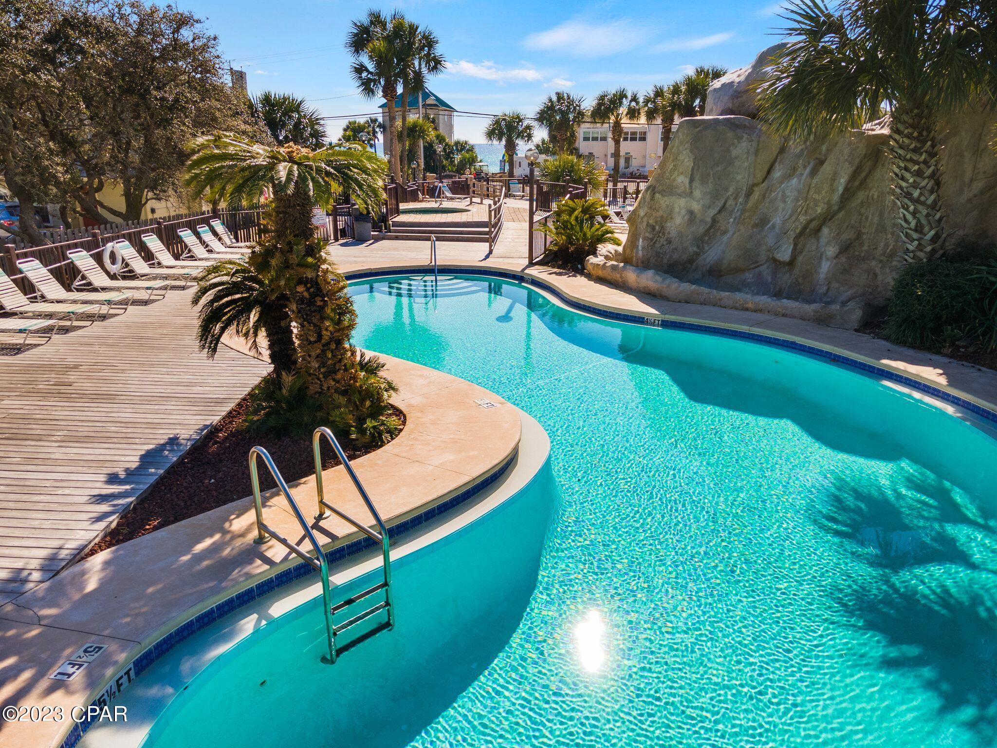 UNDER CONTRACT. SELLER ACCEPTING BACKUP OFFERS. Welcome to your new 2 Bed/ 2 Bath Beach condo in the sought after Portside Resort, located on the west end of Panama City Beach!  This Beach Condo is perfect for a second home, as well as an income generating vacation rental investment property. Updates include upgraded kitchen cabinets, quartz countertops, upgraded appliances, and the private balcony has been recently replaced. This condo is offered fully furnished, and there is a storage room off the patio for your beach supplies. Directly across the street from the beach access!! Enjoy no elevators - you can walk right up to the front door from your designated parking spot. Portside Resort offers amenities including three pools (one seasonally heated), a jacuzzi, a kiddie pool, tennis courts, shuffleboard and club house. Call today!