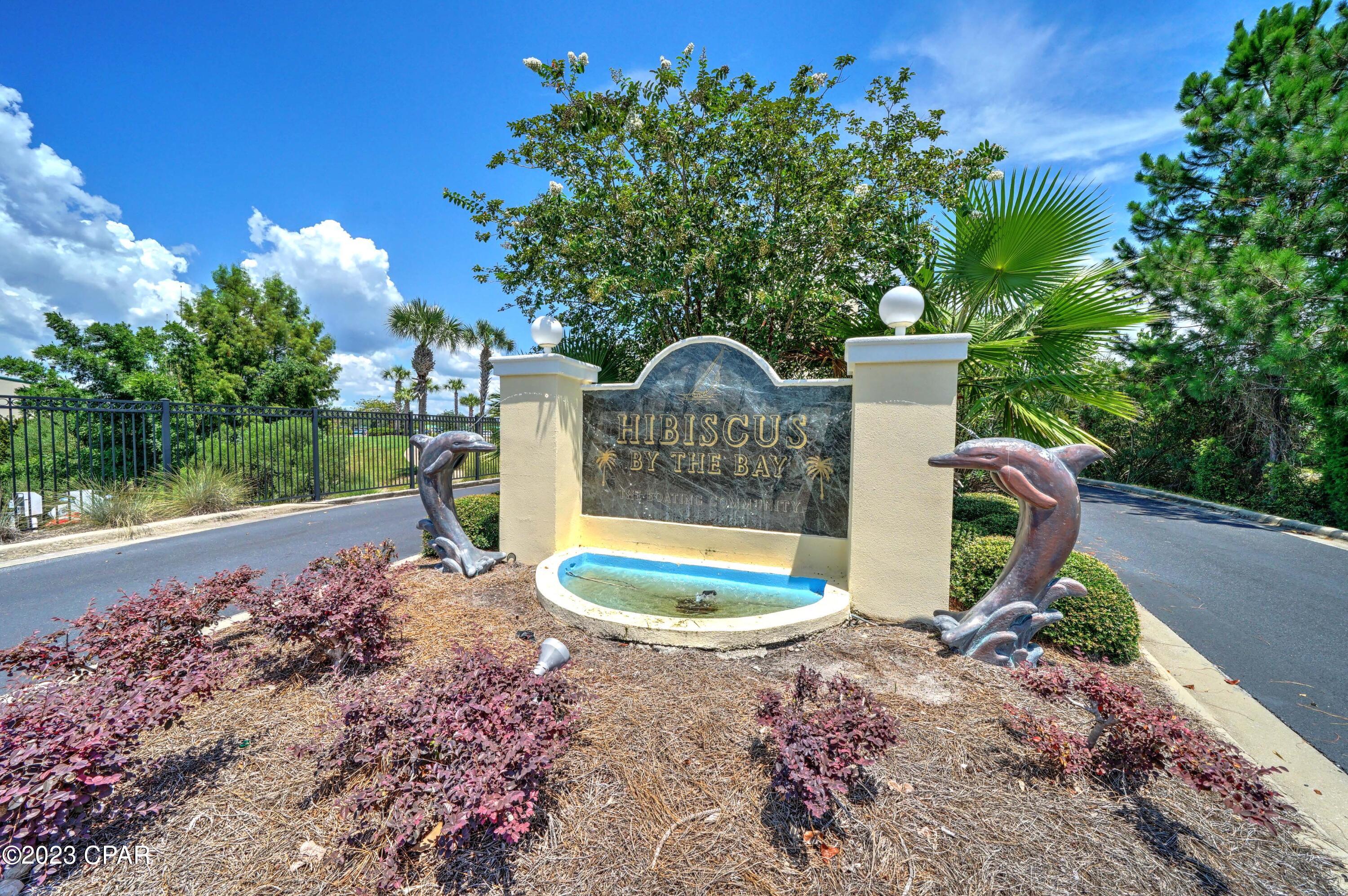 If you are searching for the finer things in life, then you absolutely want to see this condo for sale on Panama City Beach! Highly sought after North End Unit on the 8th floor with unobstructed views of St. Andrews Bay at Hibiscus By The Bay. From the balcony you have almost 180 degrees for viewing the water, wildlife, and wetlands. With these views, you'll look forward to that first cup of coffee in the morning as the sun rises over Panama City. The balcony has access from the living room and master bedroom. This 3 bedroom 2 and a half bath condo comes fully furnished (minus a few personal items) with over 2000 sq/ft of living space. This condo is one of the only few in the whole development where the owner took the initiative to customize the kitchen and laundry space to make it more efficient.  In doing so, it opened much more storage and countertop space. The kitchen remodel features new granite counters, new sink and faucet, new cabinets and new LG appliances including an air fryer stove. Appliances still have over a year of warranty. Plus, the laundry space of the original floor plan has been moved into the storage closet, which still has space for storage of tools, cleaning materials and more.  In its place there are now extra cabinets, pantry storage, a coffee bar and mini fridge.  The bathrooms have all been upgraded as well.  The master bath has a new double vanity with new mirrors and modern lighting fixtures. The tub has been replaced in the master with a custom tile walk-in shower and a custom-built closet for extra storage. The second bathroom also has a new custom tiled tub, new vanity, and new lighting. The half bath features a new vanity, new faucet, and lighting. Every inch of flooring has been upgraded to premium vinyl flooring, except the bathrooms which are all tiled. Also, every inch of the walls has gotten a fresh coat of paint.  New ceiling fans throughout the unit as well.  Washer and Dryer included in sale. Hibiscus By The Bay offers a fully gated community, Bayfront pool and hot tub, tennis courts, private owner's lounge, and a fishing pier. Short-term rentals are not allowed. Marina boat slips and private garages can be purchased separately. All measurements are approximate and should be verified if important. Call a REALTOR today and schedule an appointment to view the views of the magnificent condo for sale.