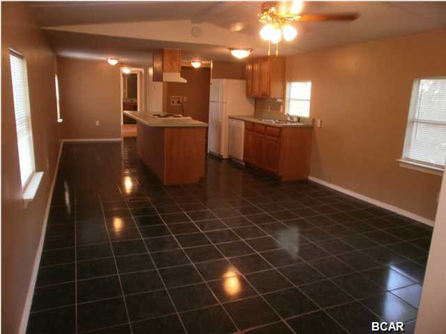 This quiet singlewide mobile home is located in Callaway with new paint and recently finished tile and wood flooring. It has an open cozy living and dining room. A nice laminated kitchen island. Features a washer and dryer hook up, and a brand new fridge and dish washer. Master bedroom has a relaxing tub and shower with a walk in closet.