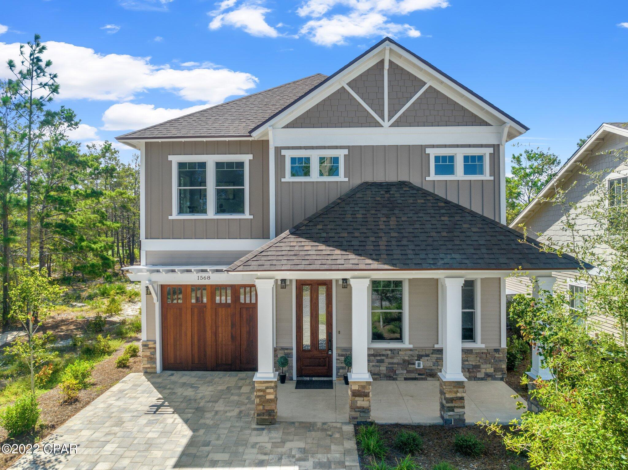 Excellent opportunity to Buy  NEW CONSTRUCTION from Leading Builder at Bay County in highly desirable WILD HERON!  The Craftsman style home is located on a peaceful street with a backyard that overlooks the award winning Shark's Tooth Golf Course. This 2 story residence offers an open floor plan, 4 bedrooms, 3.5 bathrooms with a stunning master suite on the first floor. Interior features include quartz tops, beautiful flooring, stainless appliances & spacious bedrooms with tray ceilings. Wild Heron residents enjoy 24 hour security, Sharks Tooth Golf Course, lit clay tennis courts, boardwalks, nature trails, swimming pool, hot tub, fitness center, boathouse with kayaks for resident's use and access to Lake Powell. If you are ready to enjoy this exclusive address, you must see this one today