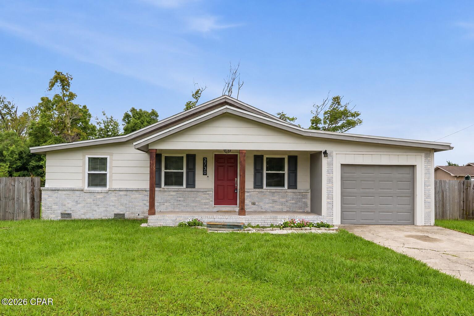 Opportunity awaits with this 4-bedroom, 2-bath home conveniently located in the heart of Panama City! Offering 1,281 square feet of living space, this property features an open semi-split floor plan, vinyl plank flooring, abundant natural light, and an interior laundry room. The kitchen includes newer cabinetry, quartz countertops, stainless steel appliances, a breakfast bar, and a buffet-style serving area with open shelving.

The primary suite offers a walk-in closet with built-in shelving and an adjoining bath with a large walk-in shower. Outside, you'll find a welcoming front porch and a spacious fenced backyard with plenty of room for outdoor enjoyment.

This property is being sold AS IS. Whether you're an investor, flipper, or buyer looking to renovate and build equity, this home offers excellent potential in a central location. Situated in an X Flood Zone with no HOA. Measurements are approximate. Some photos may be virtually staged or digitally enhanced. Buyers should verify all property features, measurements, and conditions in person.