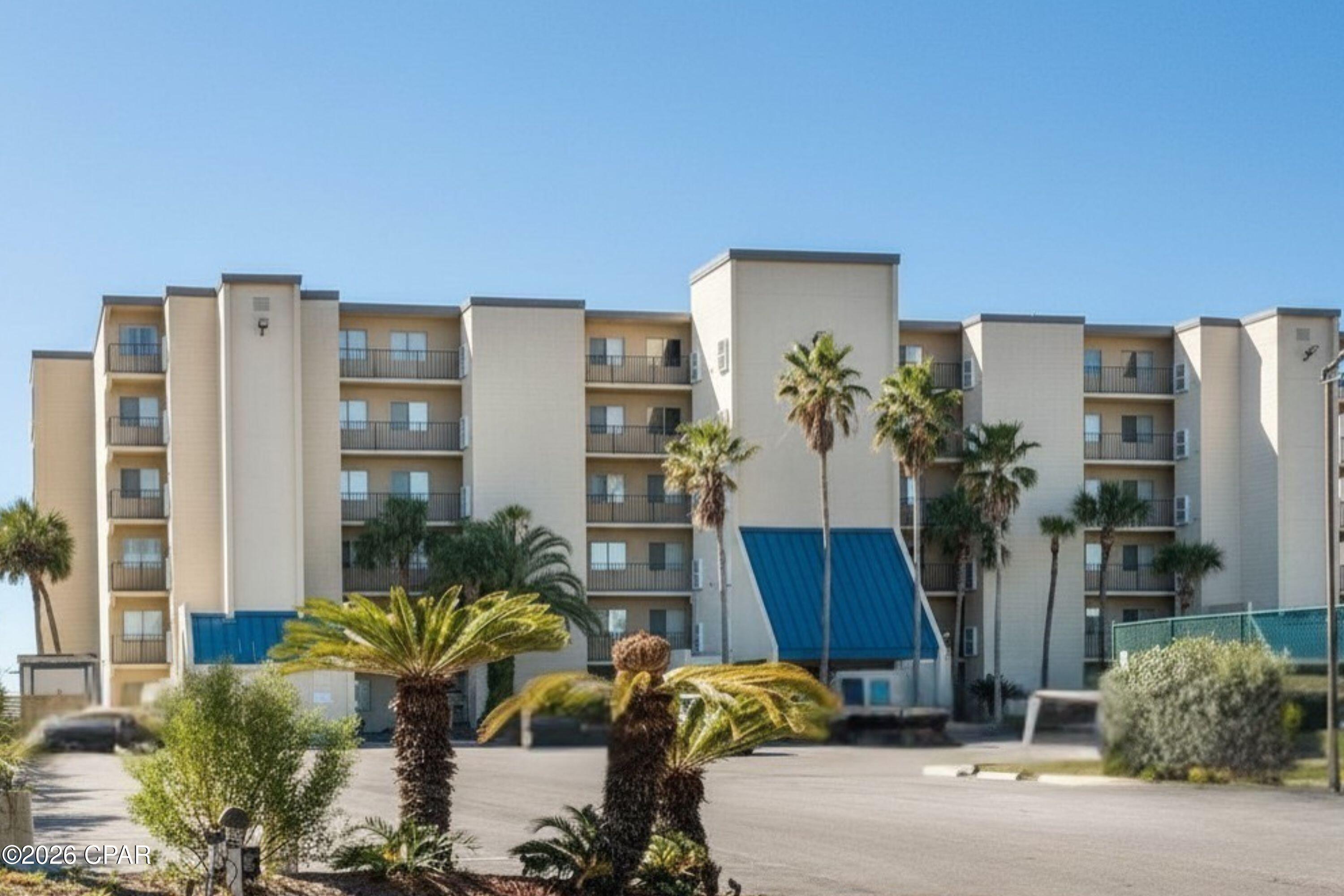 A rare opportunity! Welcome to coastal living at Mariner East -- a highly sought-after low-density Gulf-front condominium nestled along the sugar-white sands of the Gulf of America.
This 5th-floor unit presents an exceptional opportunity for a new owner to complete renovations already underway following Hurricane Michael. Major improvements have already been started, including new sheetrock installation, electrical upgrades and replacement of the balcony sliding glass door, creating a solid foundation to add your own finishing touches and personal style. Offered As Is, this property offers outstanding potential as a primary residence, second home, or short-term rental investment. Enjoy breathtaking Gulf views from the spacious covered balcony overlooking the pool area -- the perfect setting for morning coffee, coastal breezes, and unforgettable sunsets. Additional features include a convenient exterior storage area just outside the front door for your washer and dryer. The Mariner East community has undergone extensive post-Hurricane Michael improvements and upgrades, with reserve study and building inspections completed, providing added confidence and peace of mind for owners and investors alike. Ideally located near Naval Support Activity Panama City, as well as popular restaurants, shopping, entertainment, and local attractions, this property offers the perfect blend of convenience and beachside relaxation. Units at Mariner East rarely become available and tend to sell quickly. Don't miss this opportunity to own your own piece of paradise on the ''World's Most Beautiful Beaches!'' A blank canvas for creating your own coastal retreat.  All measurements are approximate and should be verified by buyer if important. Property is being sold As Is.